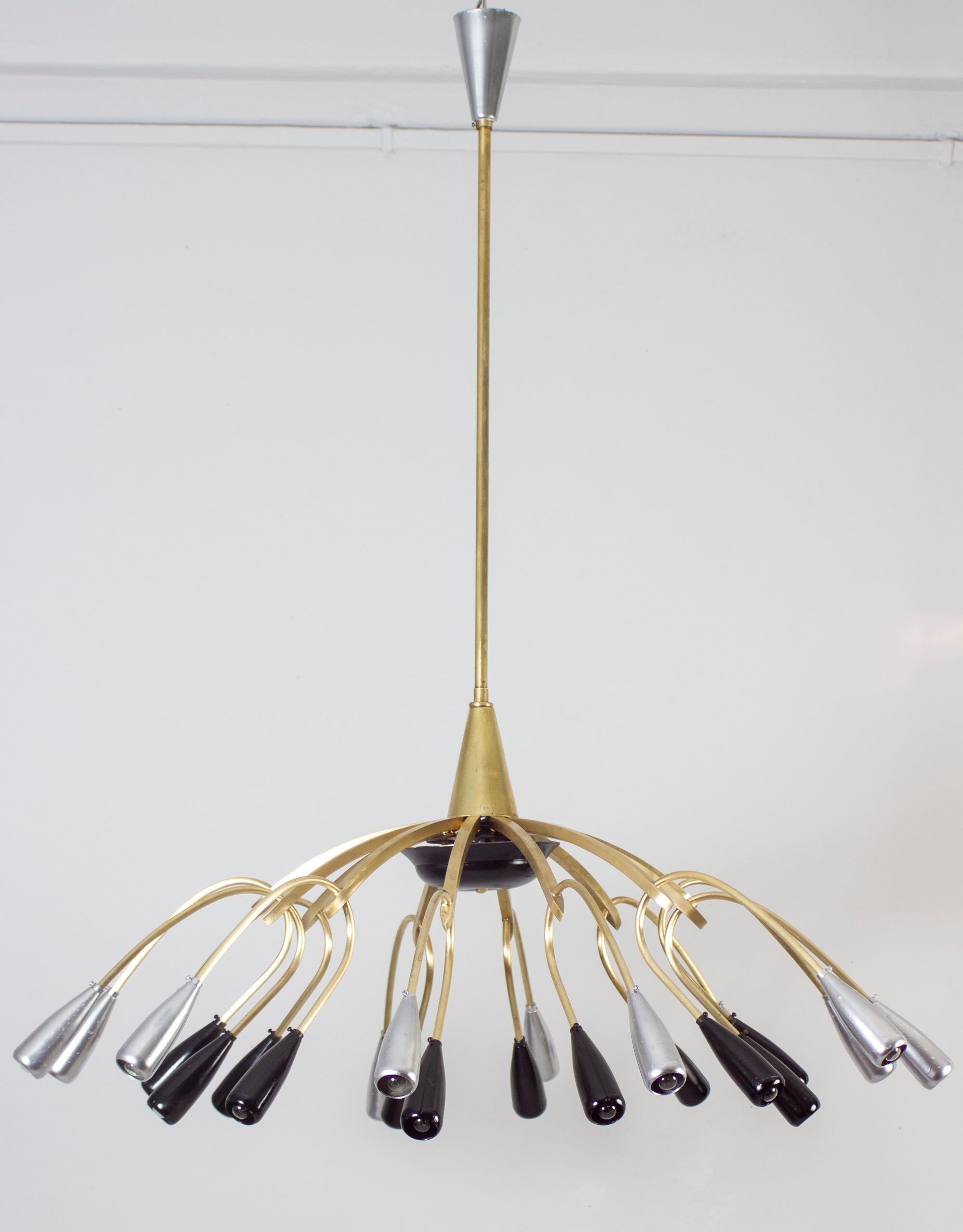 Linear elegance, brass and black painted six arms chandelier, holding round opaline glass shades. Excellent vintage condition.
Six E14 light bulbs.
 