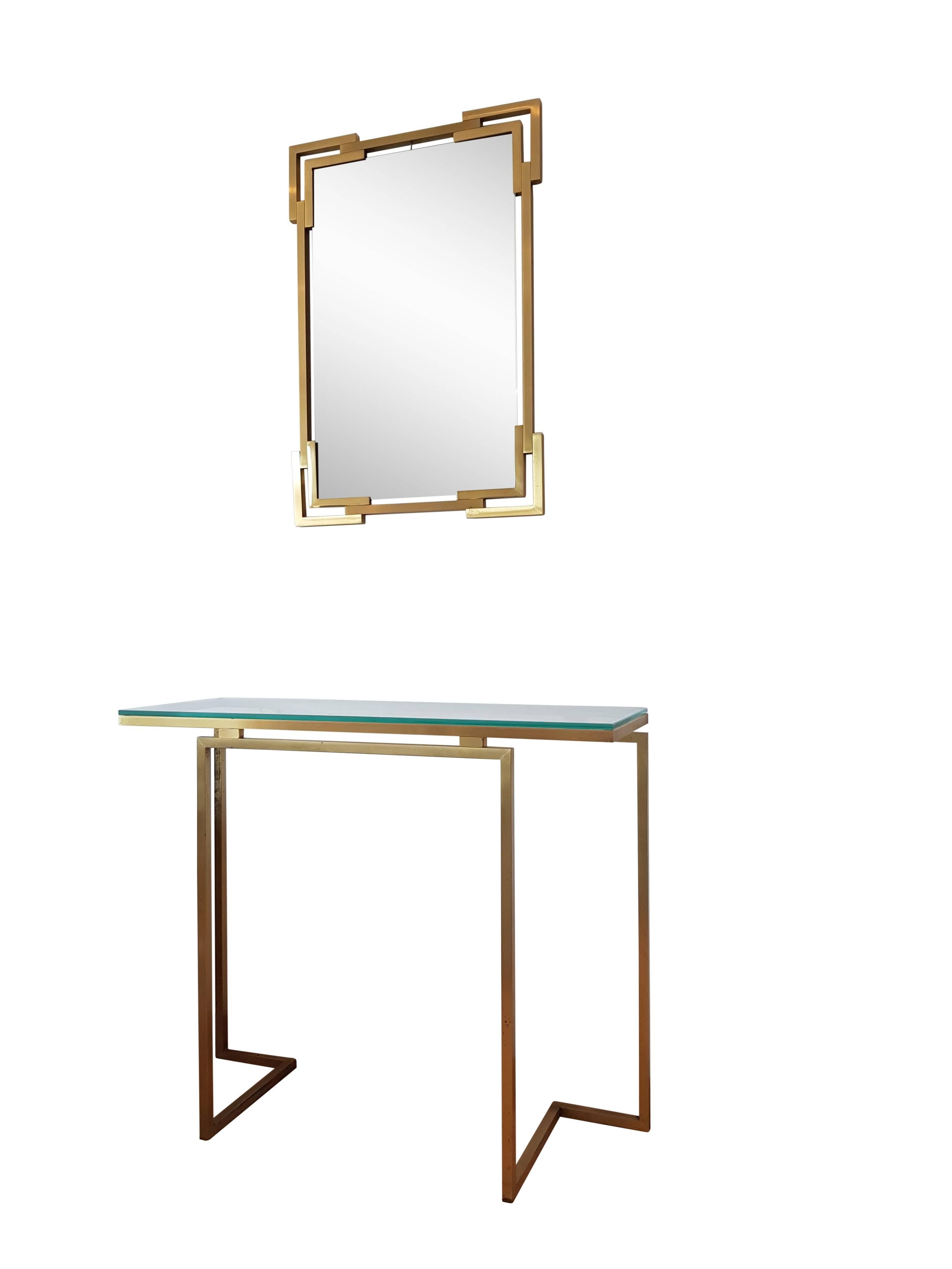 Very fine and elegant combination of a console table and a mirror from Guy Lefevre for Maison Jansen.
This is a high quality piece!
Beautiful set to combine in an interior with Willy Rizzo, Romeo Rega, J.C. Mahey.

Mirror size; 60b, H 85, D 2 cm .