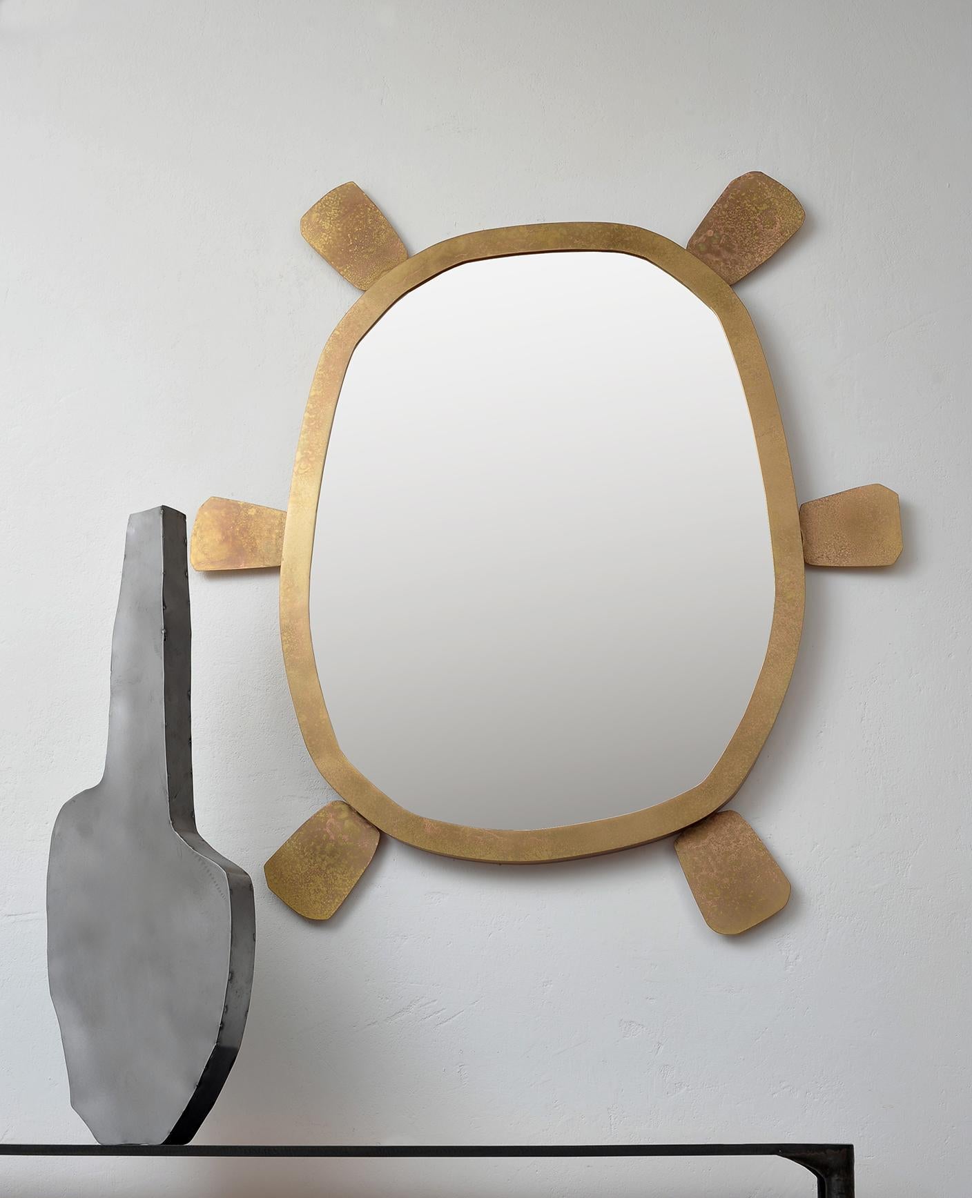 Brass mirror by Lukasz Friedrich.
Materials: patinated brass.
Dimensions: 4.5 D x 90 W x 105 H cm.
Also available in Dark Patina.

Lukasz Friedrich (born 1980), lives and works in Warsaw. He is a self-taught
designer and craftsman. Lukasz grew up in