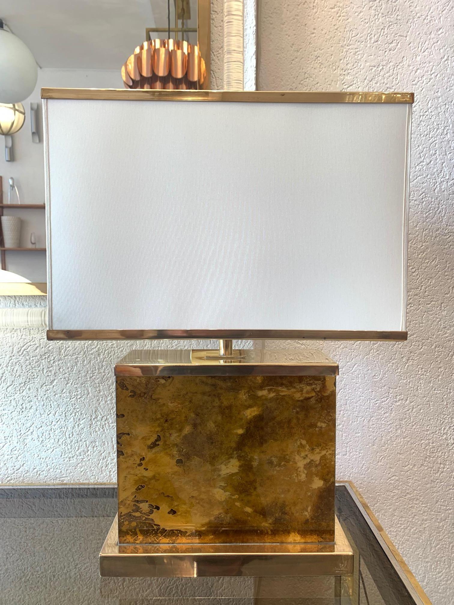 Brass and faux marble glass table lamp signed by Romeo Rega.
New paper shade with brass trim.
2 bulbs inside.
 