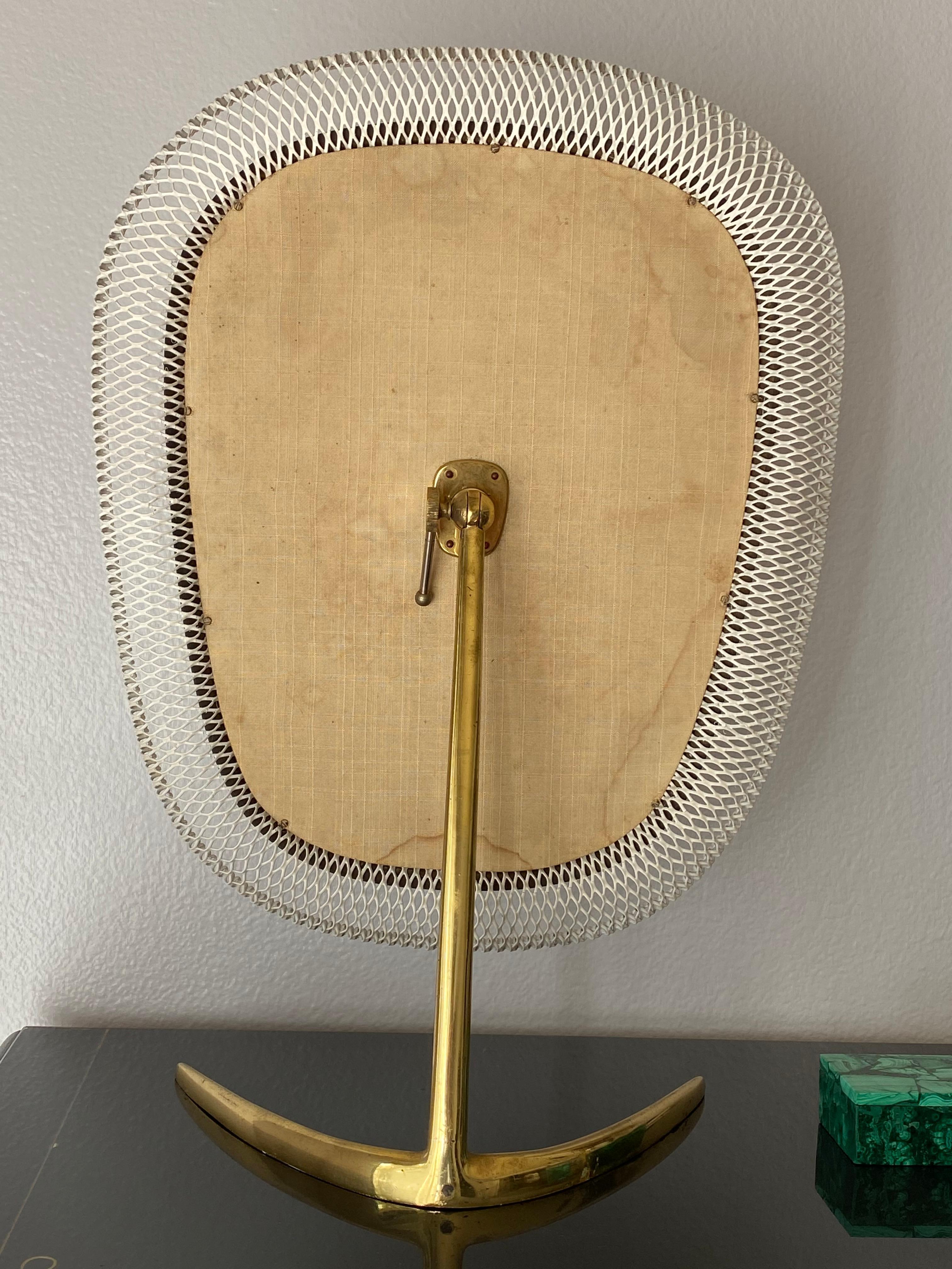 Brass modernist vanity mirror by Vereinigte Werkstätten Munchen.