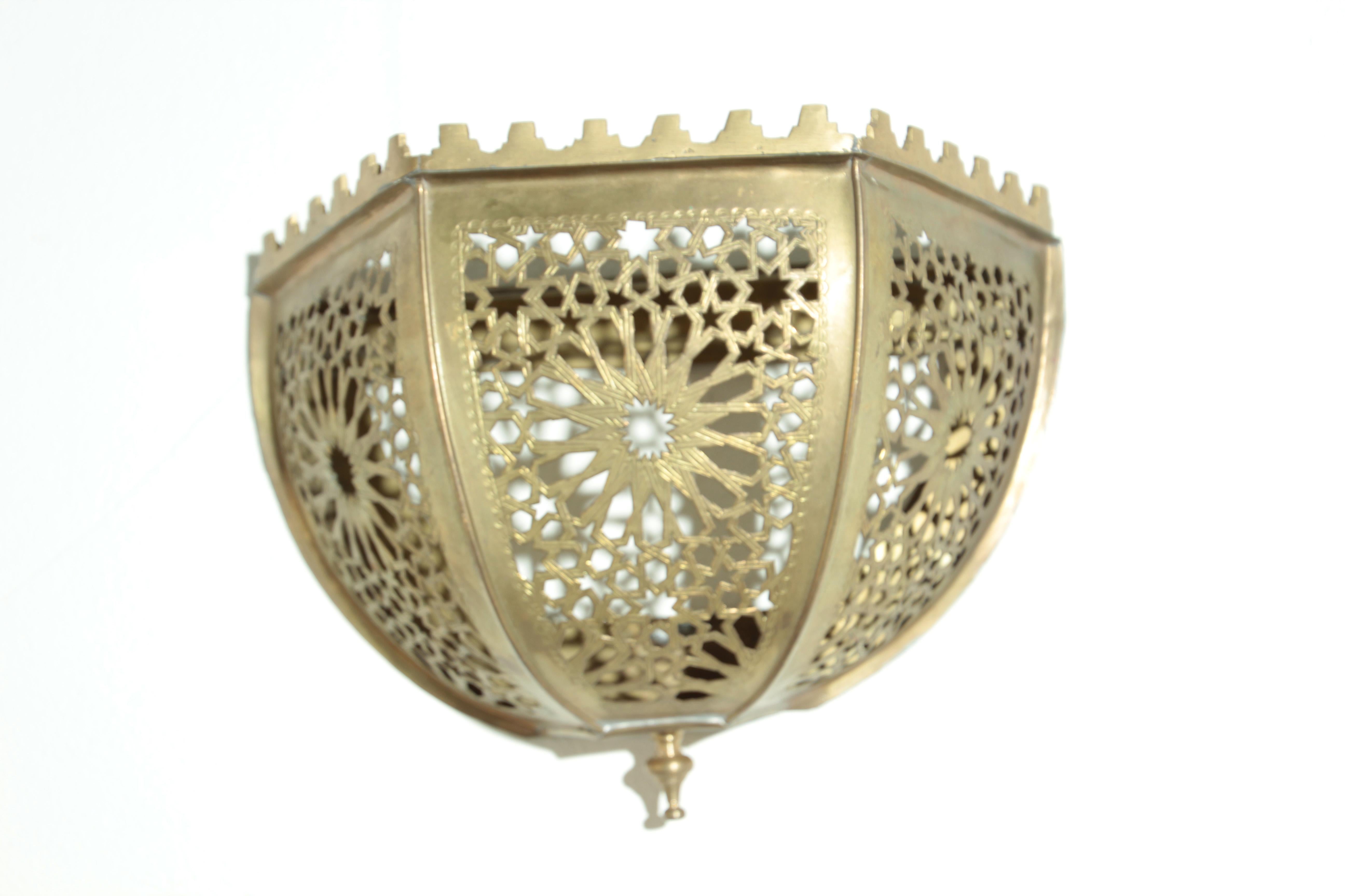 Moroccan brass handcrafted Art piece could be used as wall lamp shade.
Brass frame perfect for soft subtle sconce light.
There are no electrics within the lampshade.
They will look great over an electric fitting or just as a Moroccan Art wall