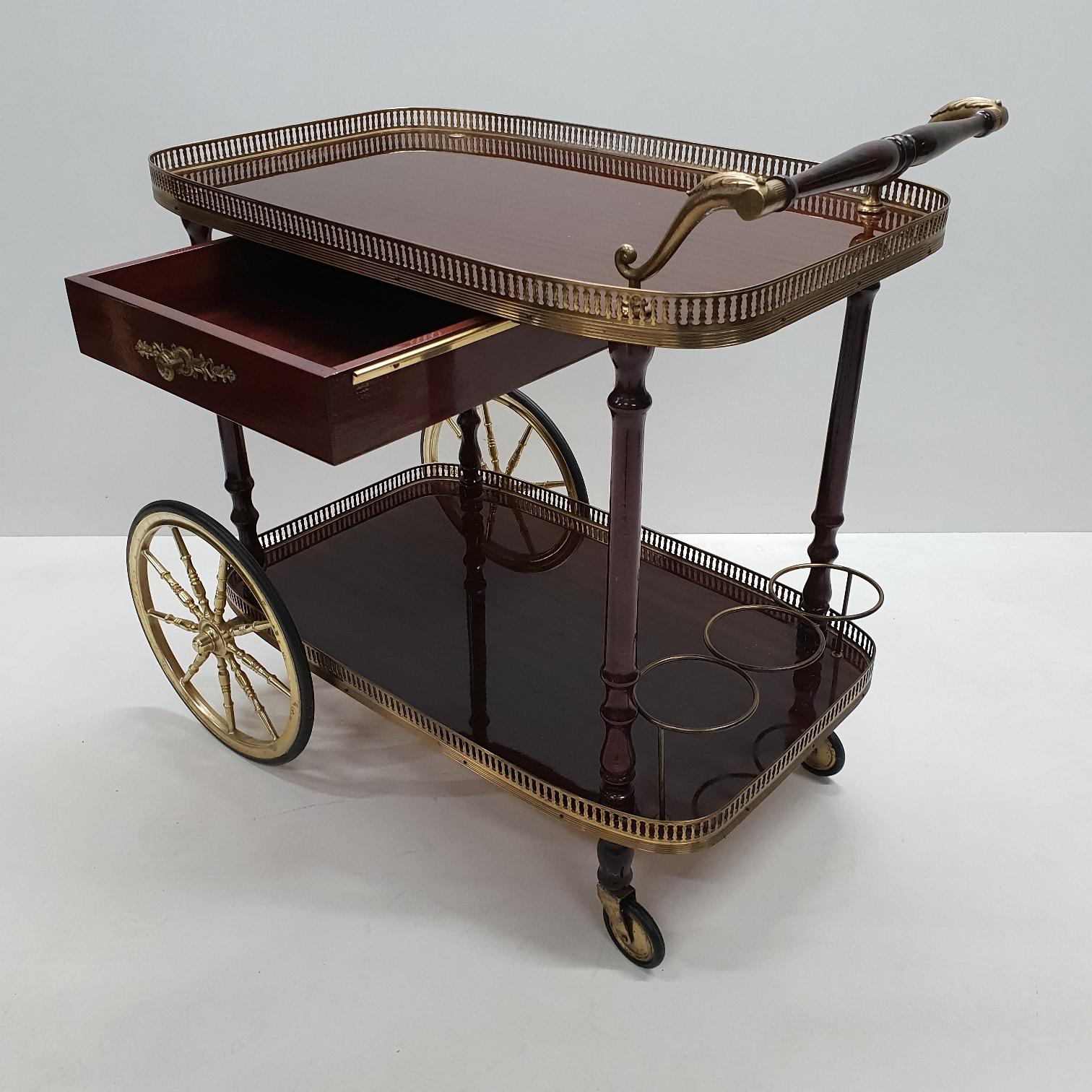 Brass neoclassical serving trolley bar cart with drawer, 1960s.
The drawer can open on both sides.
French design.