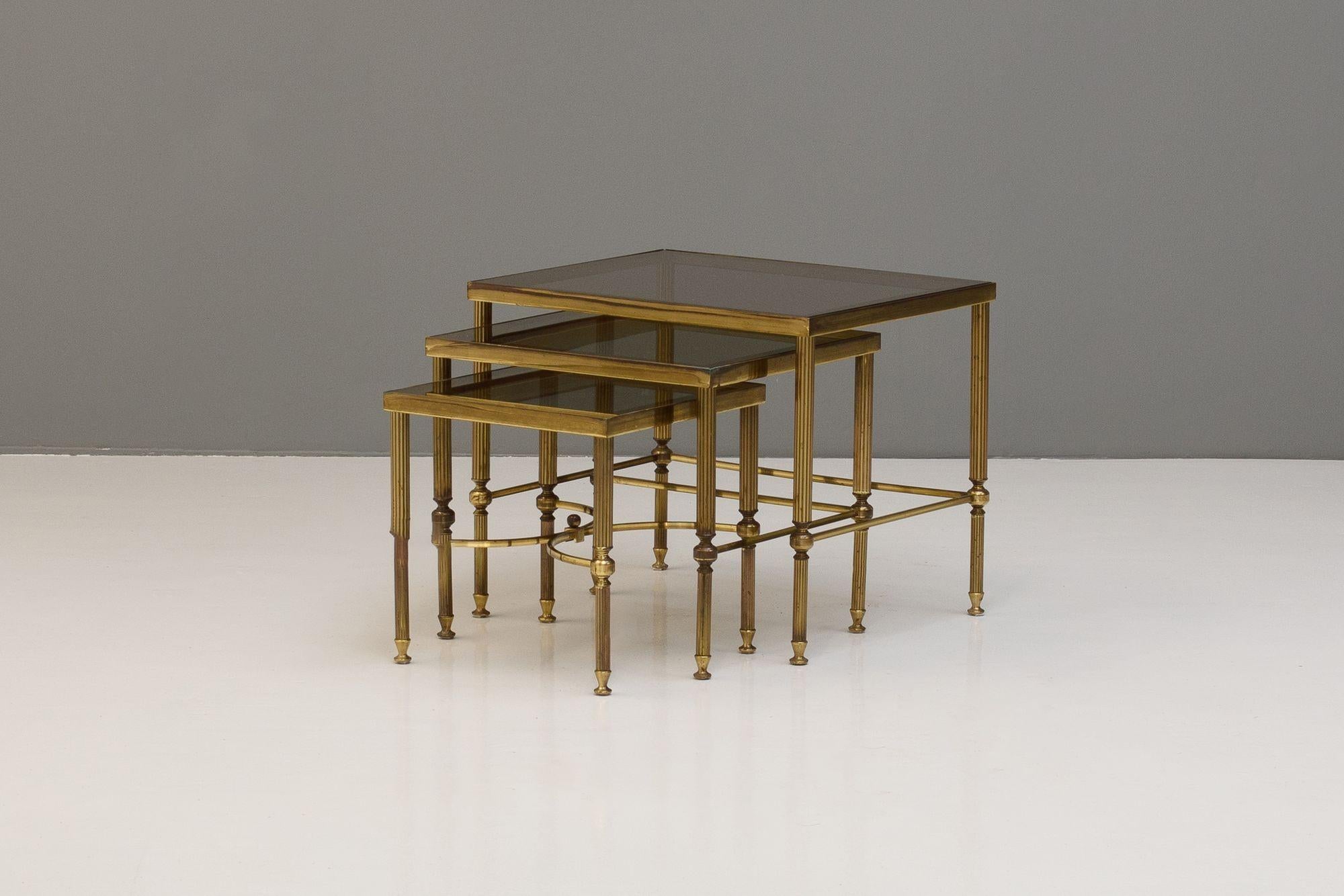 Set of 3 graduated brass framed tables with 