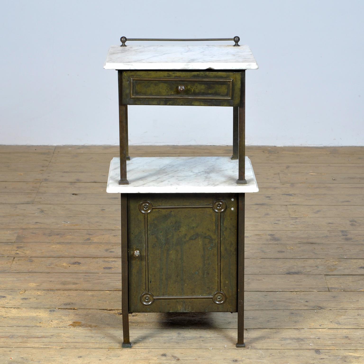 Brass hospital bedside cabinet with marble top and oak drawer. Nice details on the sides and front. Produced in the 1910's in germany.