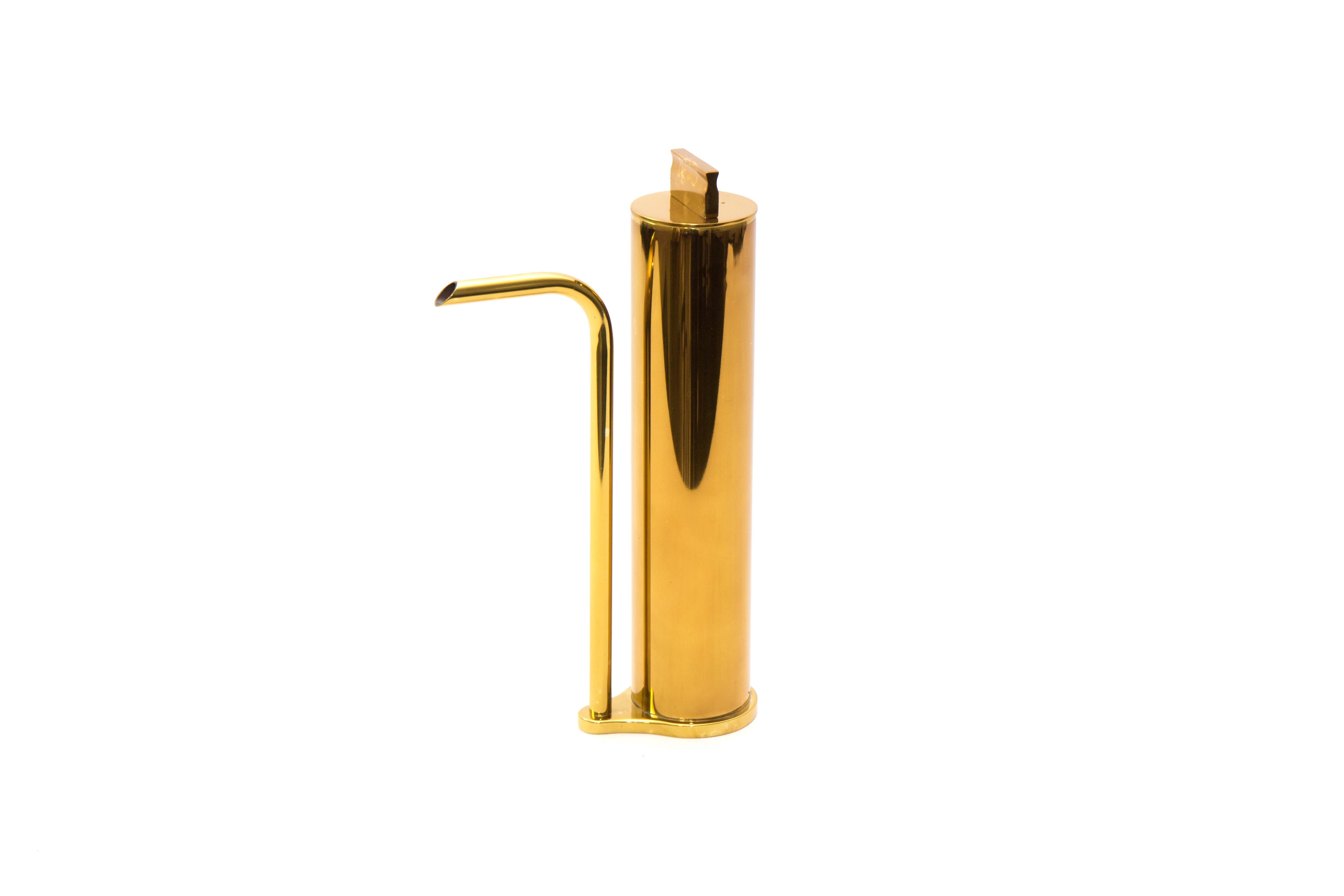 Brass oil decanter by Gentner Design
Dimensions: D 6.3 x W 10 x H 22.2 cm
Materials: polished tarnished brass

Made of brass and hand tarnished, the oil seems to magically move from the container to the spout without the two being connected. This