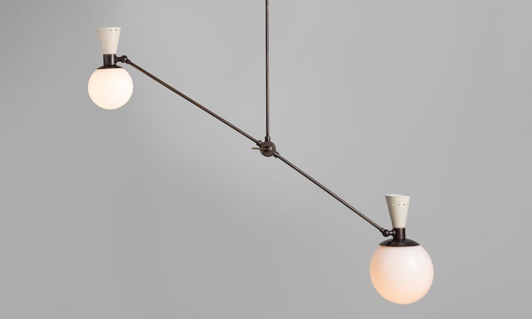 Adjustable brass rod with painted metal shades and opaline glass globes.

Made in Italy

*Please Note: This fixture is made to order in Italy, and comes newly wired (eu wiring). It is not UL Listed. Standard Lead Time is 4-6 Weeks. We do not offer