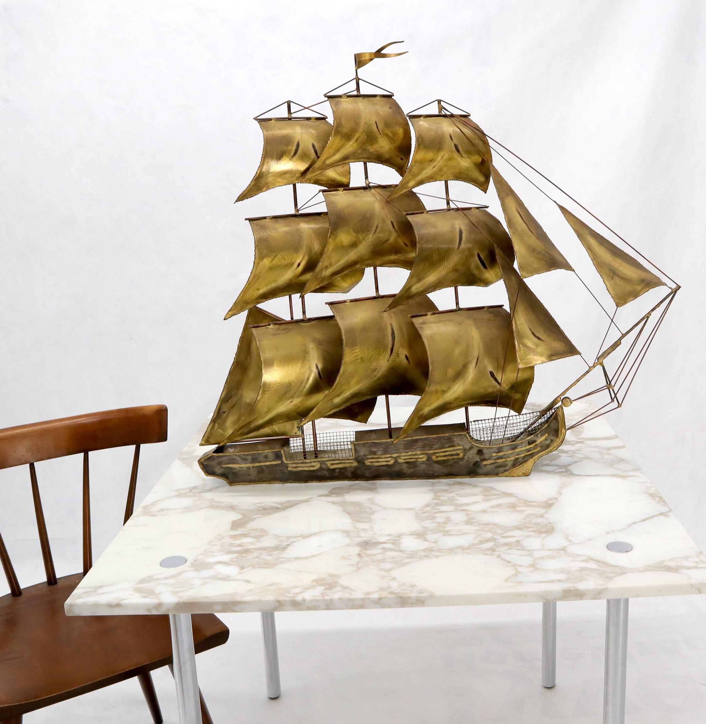 Mid-Century Modern brass sheet metal sculpture of a sail boat in style of Curtis Jere.