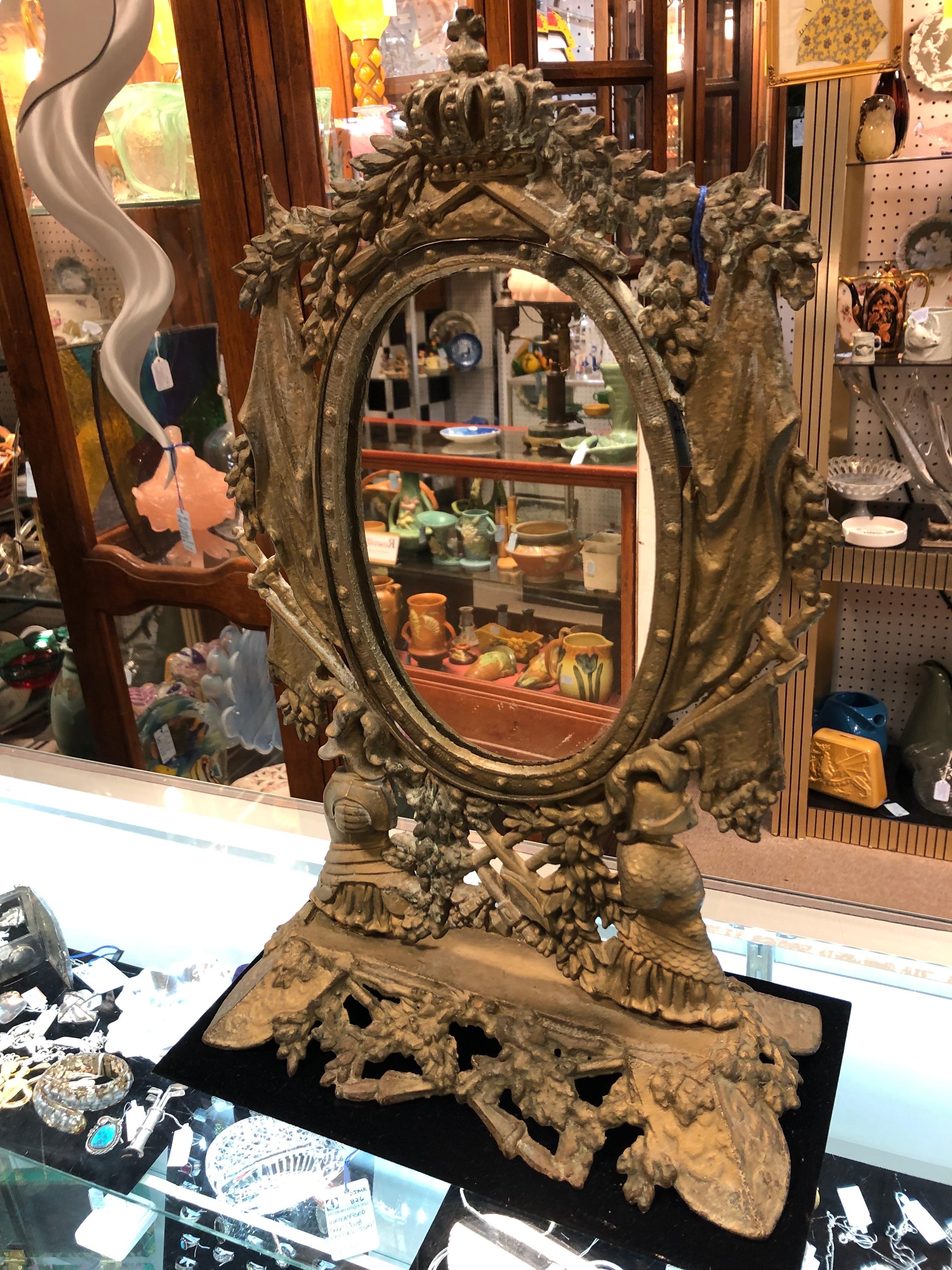 Brass Ornate Vanity Table Mirror on Stand.
Elaborate brass and gold finished mirror on stand.
Size: 13.5