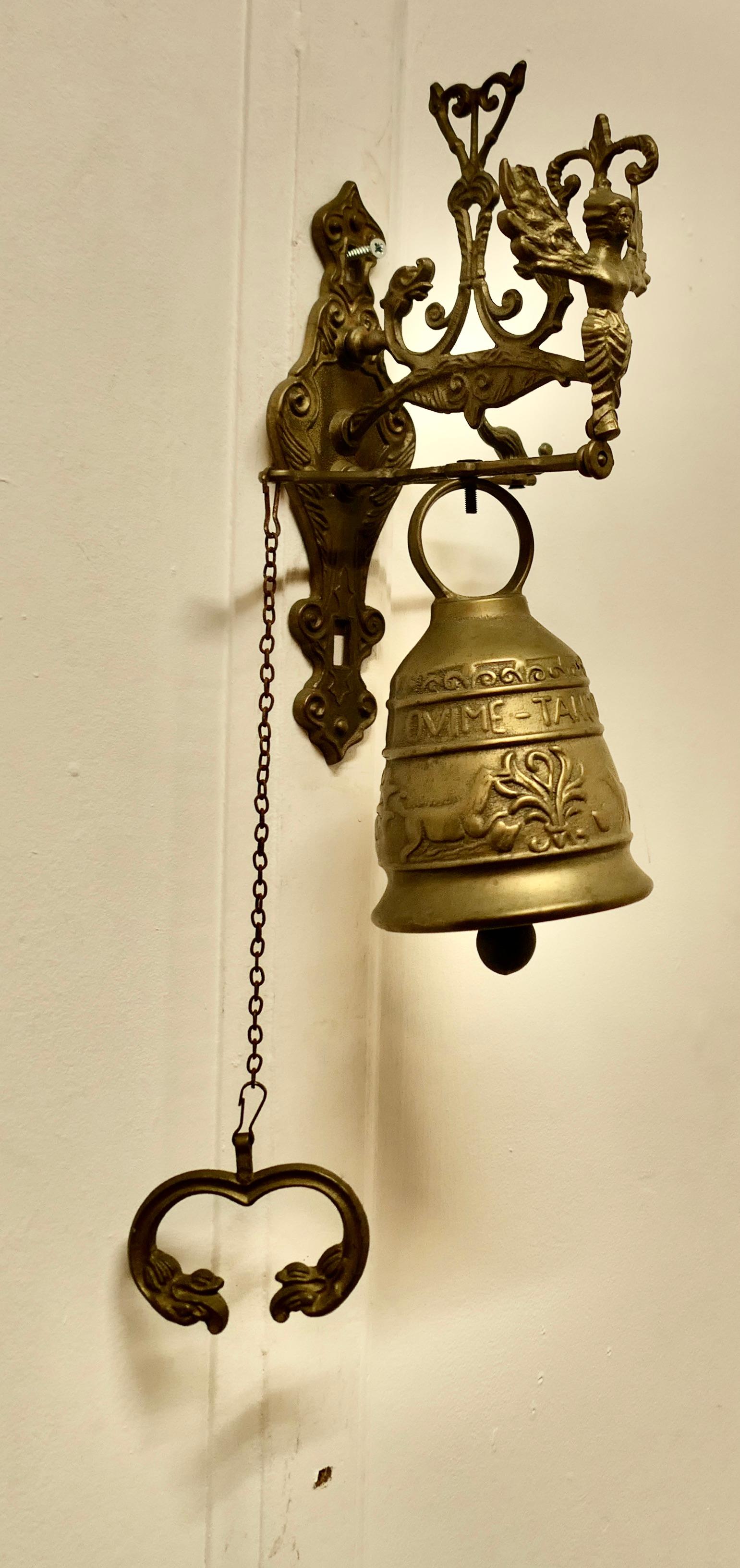 Brass Outdoor Door Bell on Hanging Bracket with Chain Pull
A very decorative piece with a delightful ring, the bell is decorated with angels and serpents it hangs on a decorative bracket with a chain pull balance on one side
The bell is 18” high,