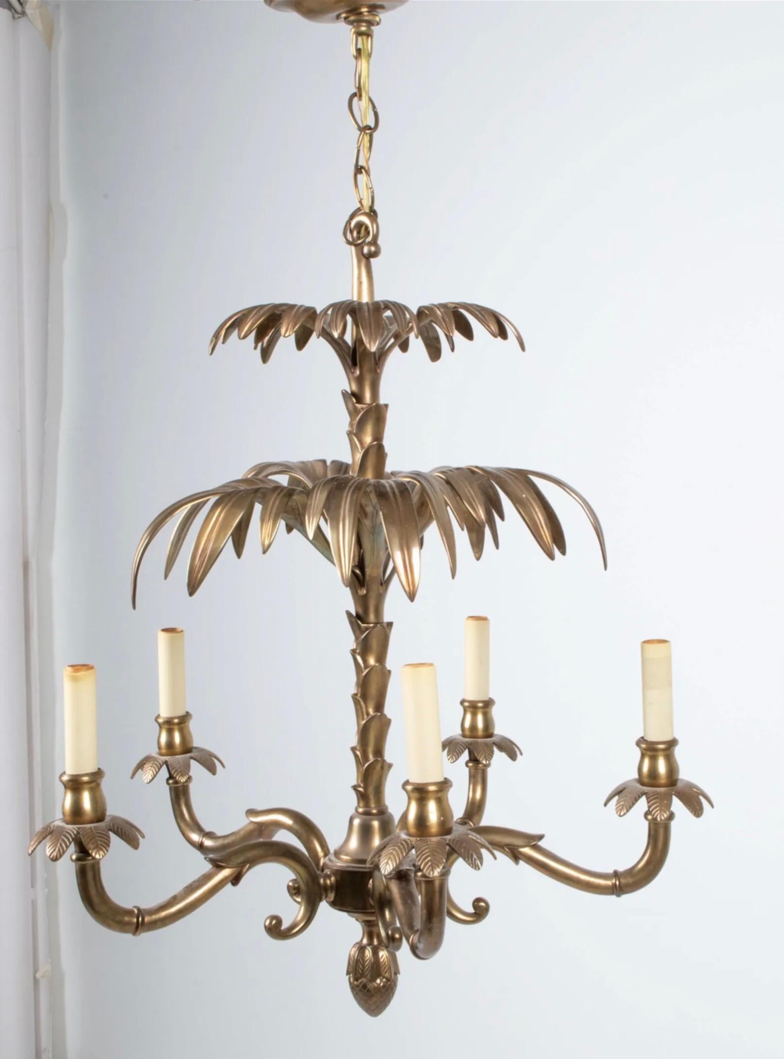 Gorgeous Hollywood Regency revival chandelier in solid brass, labeled Chapman with 1988 copyright on canopy. Dimensions: H 26