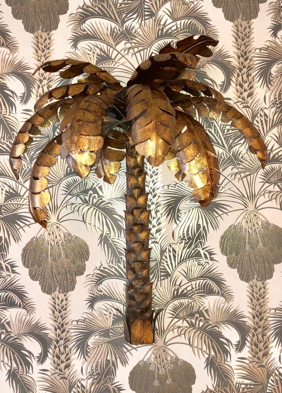 Brass metal palm wall sconces, can be wired for lights. Each palm leaf is detachable and individually placed on top part.