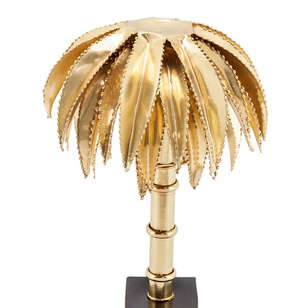 Table lamp brass palms all made in solid
brass in polished finish. On blackened base.
Also available in chrome finish.