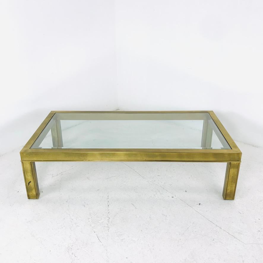 Handsome, rare brass and glass Parsons style coffee/cocktail table by Mastercraft. Good vintage condition with nice patina on brass. Circa 1970s.