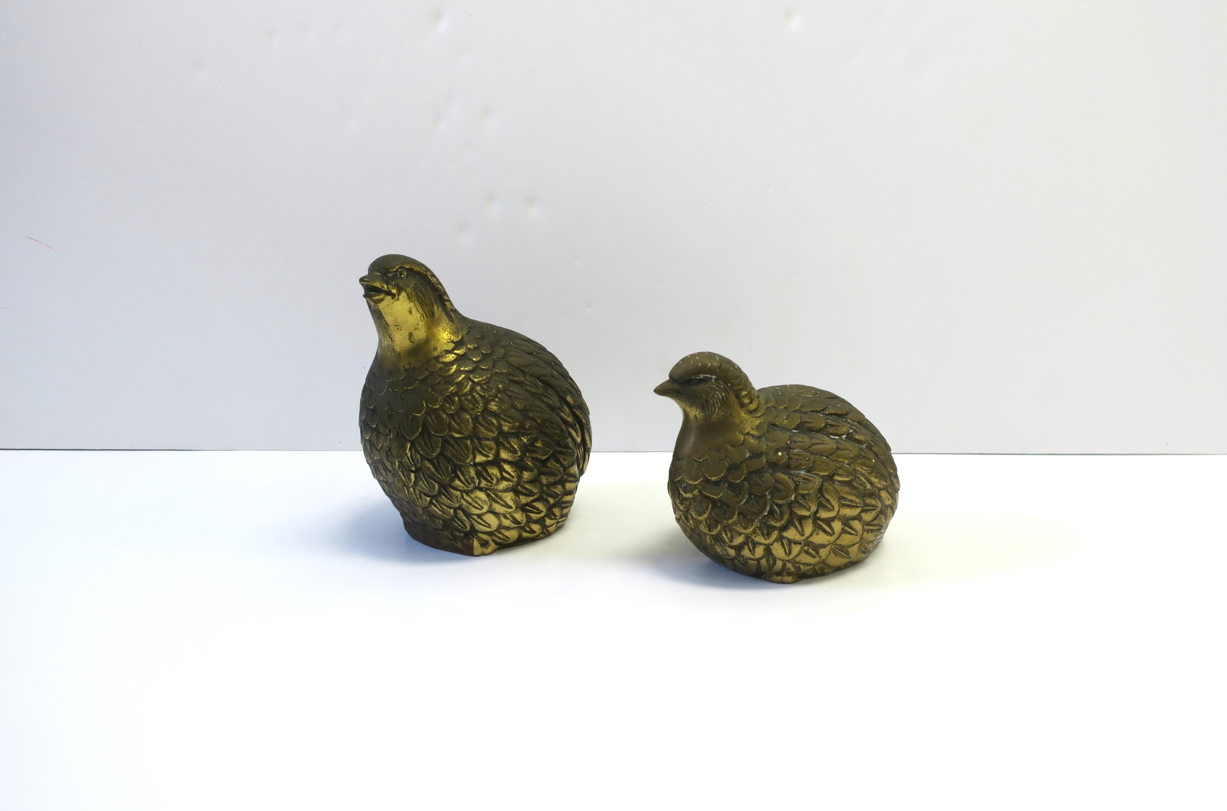 A vintage set of brass-plated partridge birds decorative objects or bookends, circa mid-20th century, 1960s. Birds are substantial and have detailed feathers around their body. Birds are in the style of Gucci Home collection (Gucci made similar mid