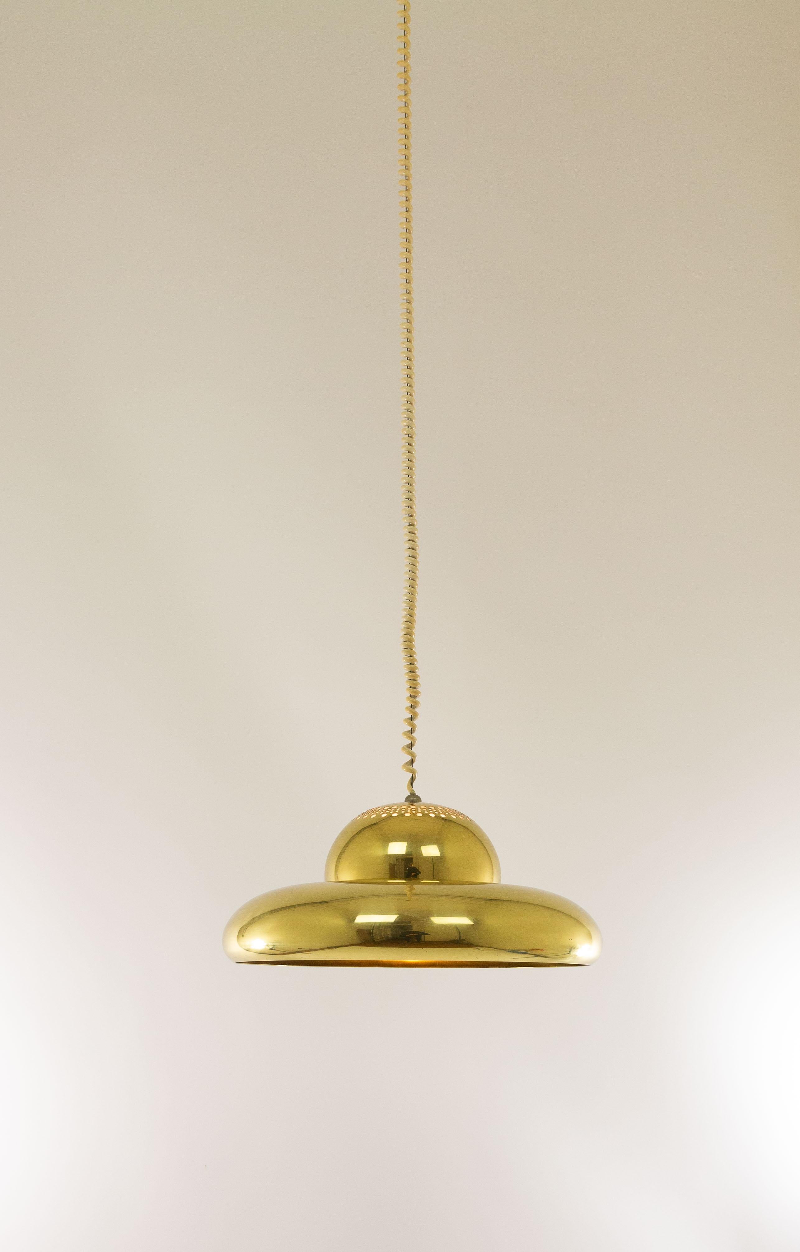 Fior di Loto pendant designed by Tobia and Afra Scarpa for Italian Lighting manufacturer Flos in 1963.

In a Flos catalogue we found this description: 