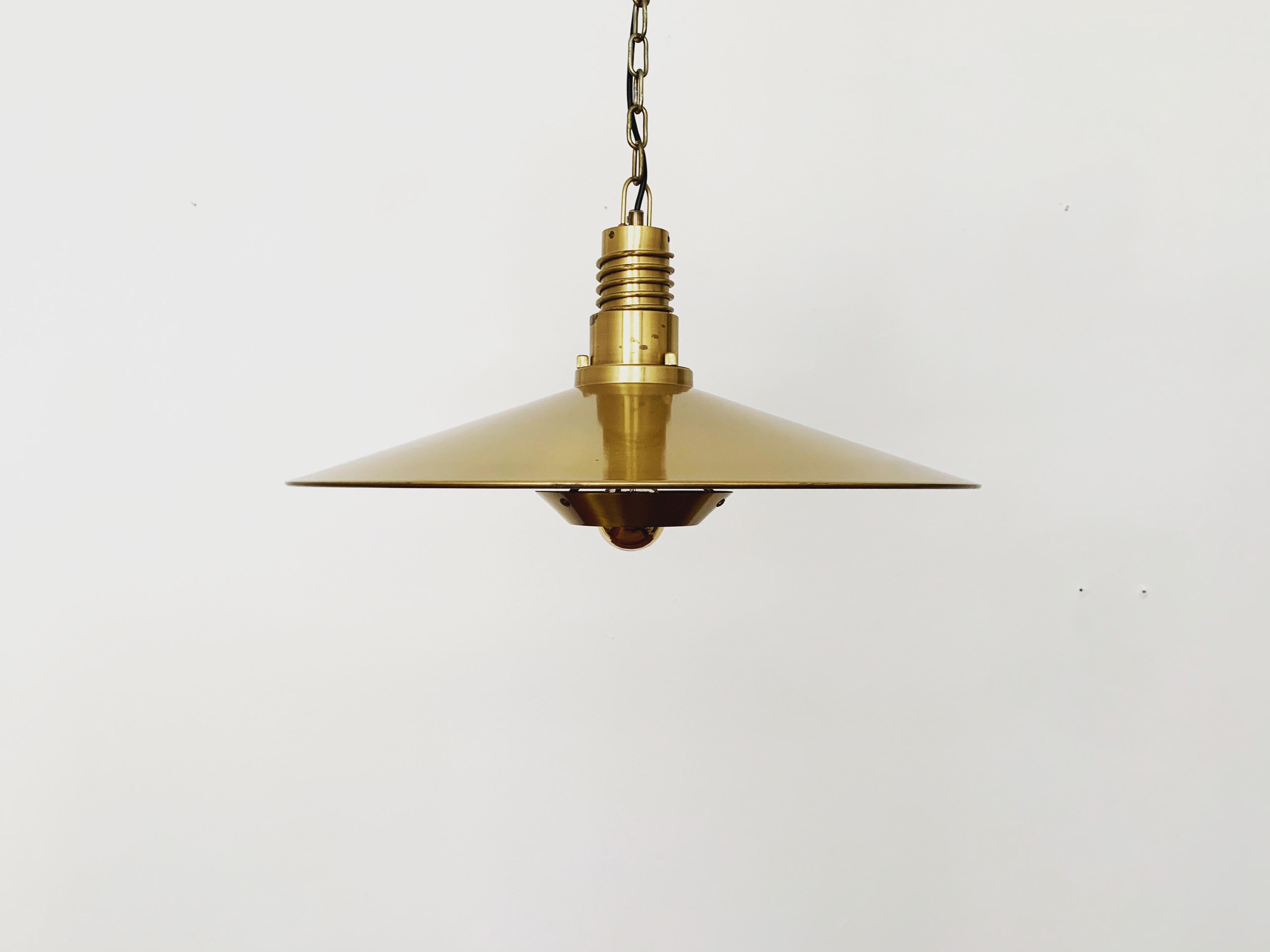 Very nice Danish brass pendant lamp from the 1960s.
The lighting effect of the lamp is extremely beautiful. The design and the very beautiful details create a very noble and pleasant light.
The lamp creates a very cozy atmosphere and is of very