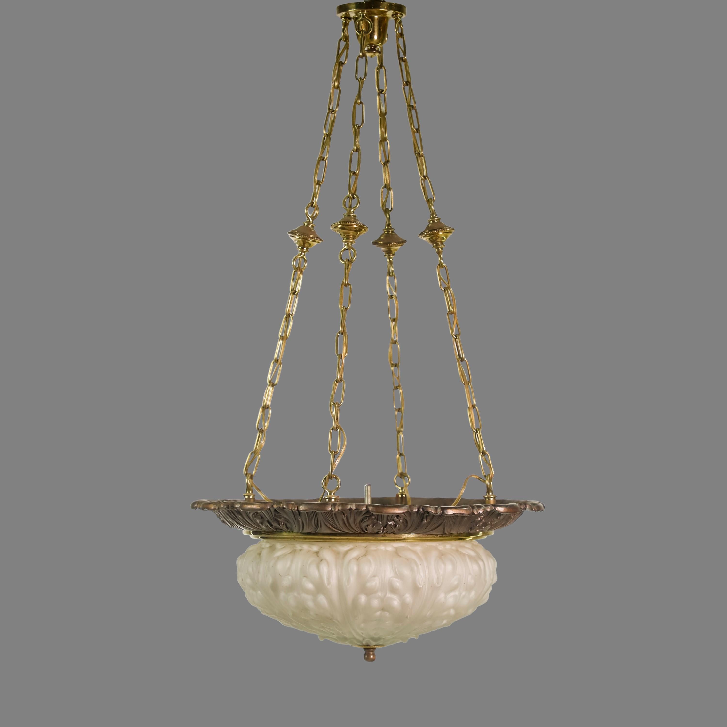 20th Century pendant light with brass hardware. Features a cast milk glass dish on bottom. Takes four standard medium base light bulbs. Cleaned and restored. Please note, this item is located in our Scranton, PA location.