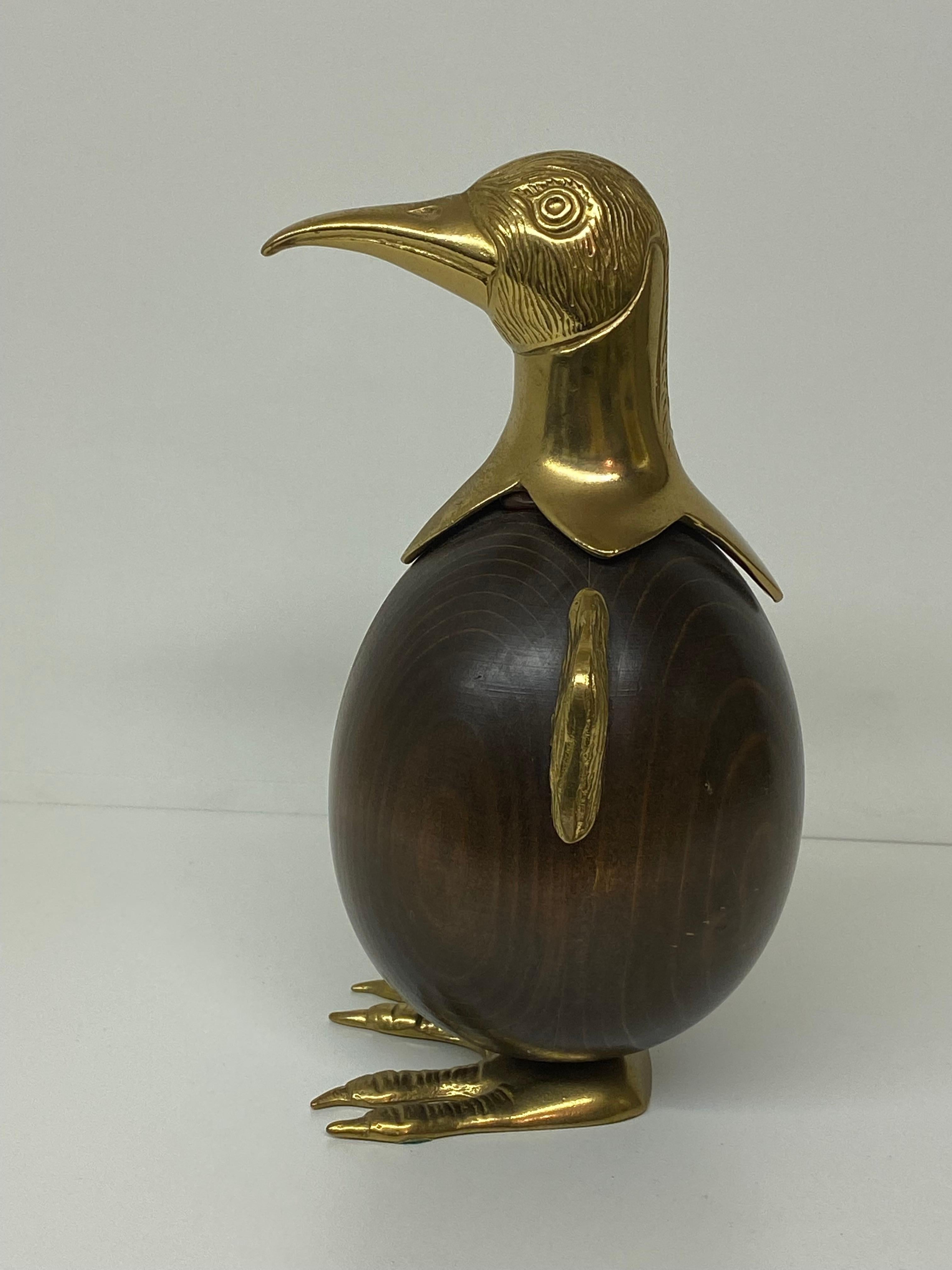 Adorable brass and wood penguin sculpture made in Italy.