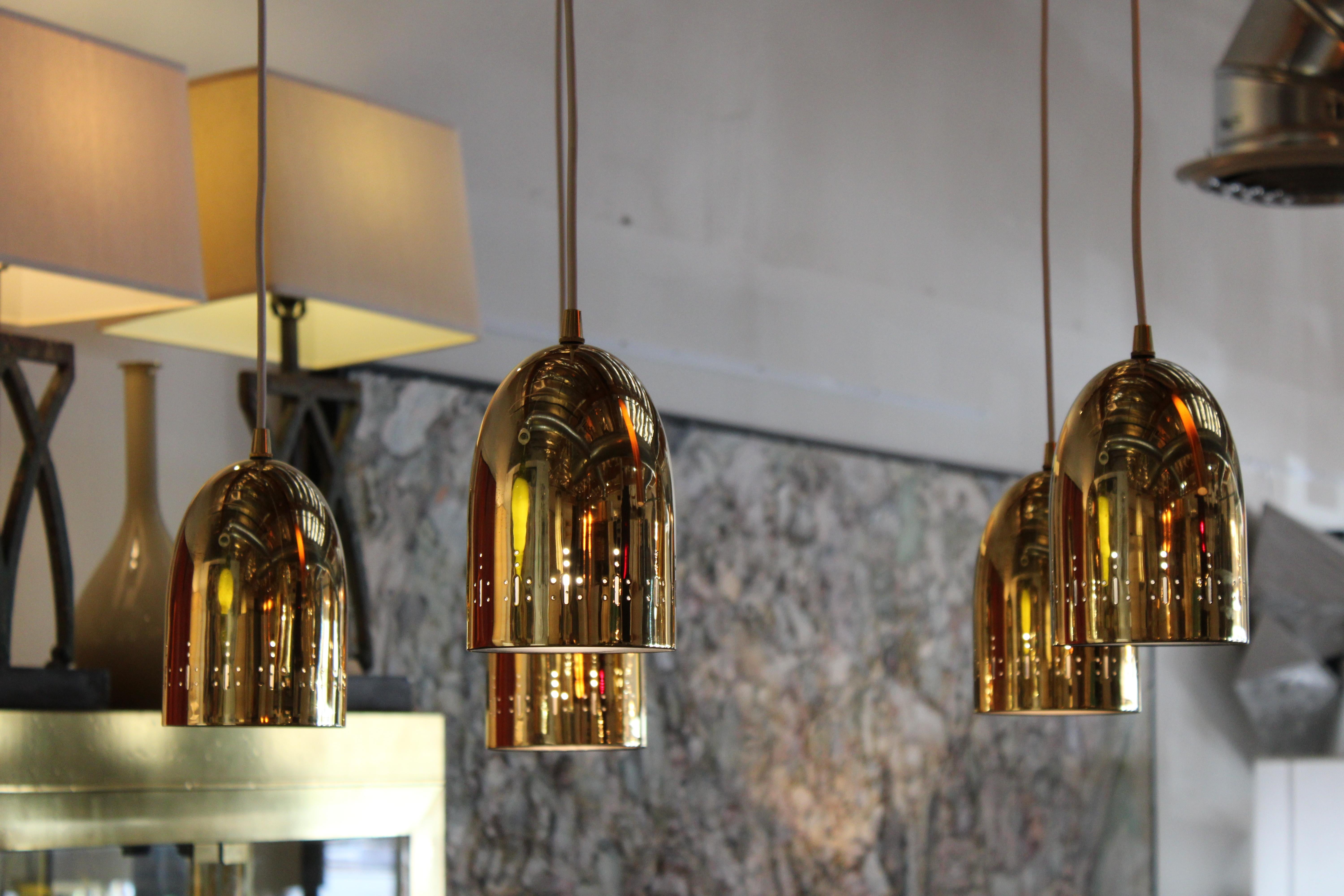 Mid-20th Century Brass Perforated Chandelier with Five Canisters For Sale