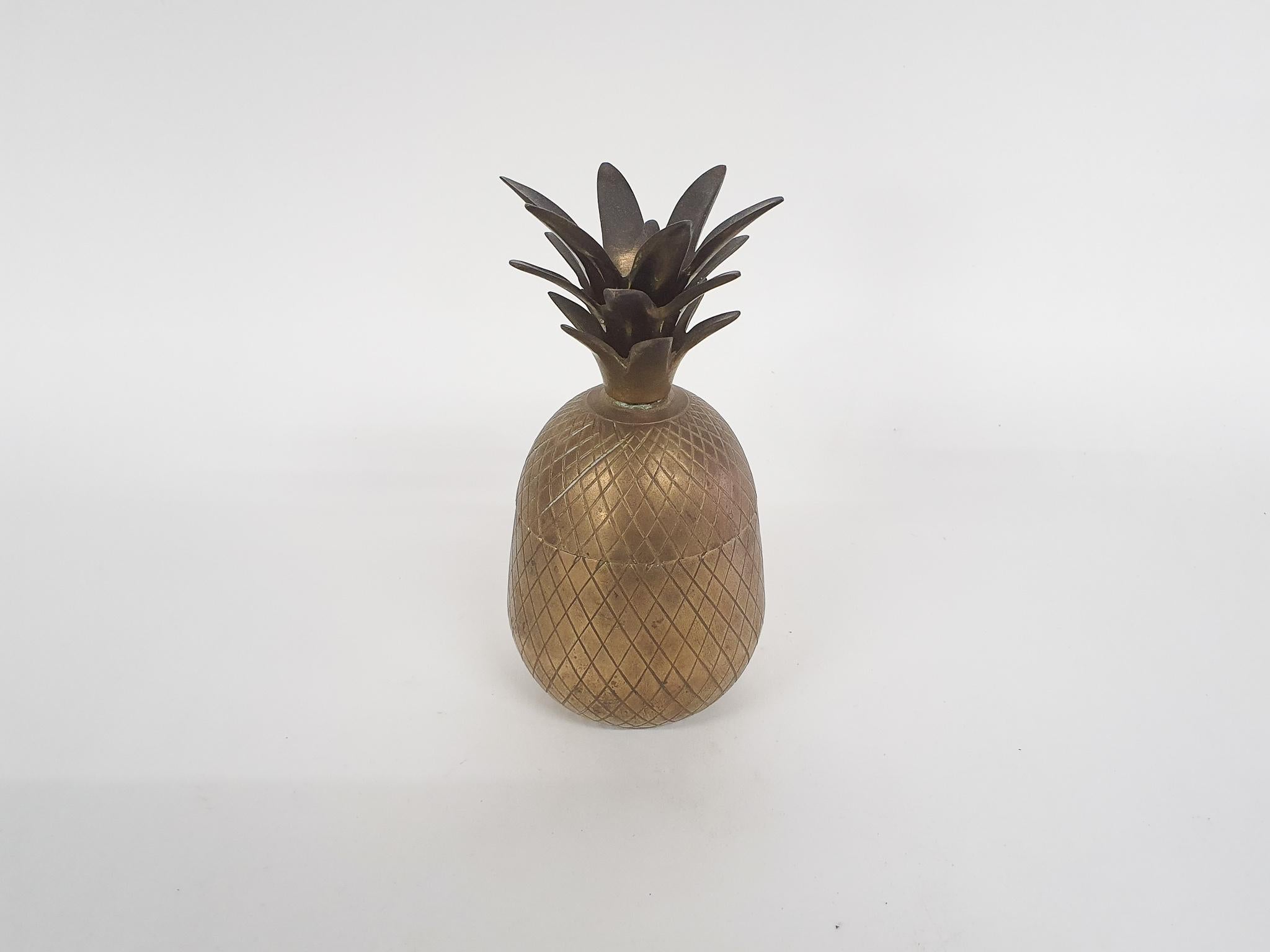 Brass pineapple, can be used as ice bucket or storage box or decorative object.

 