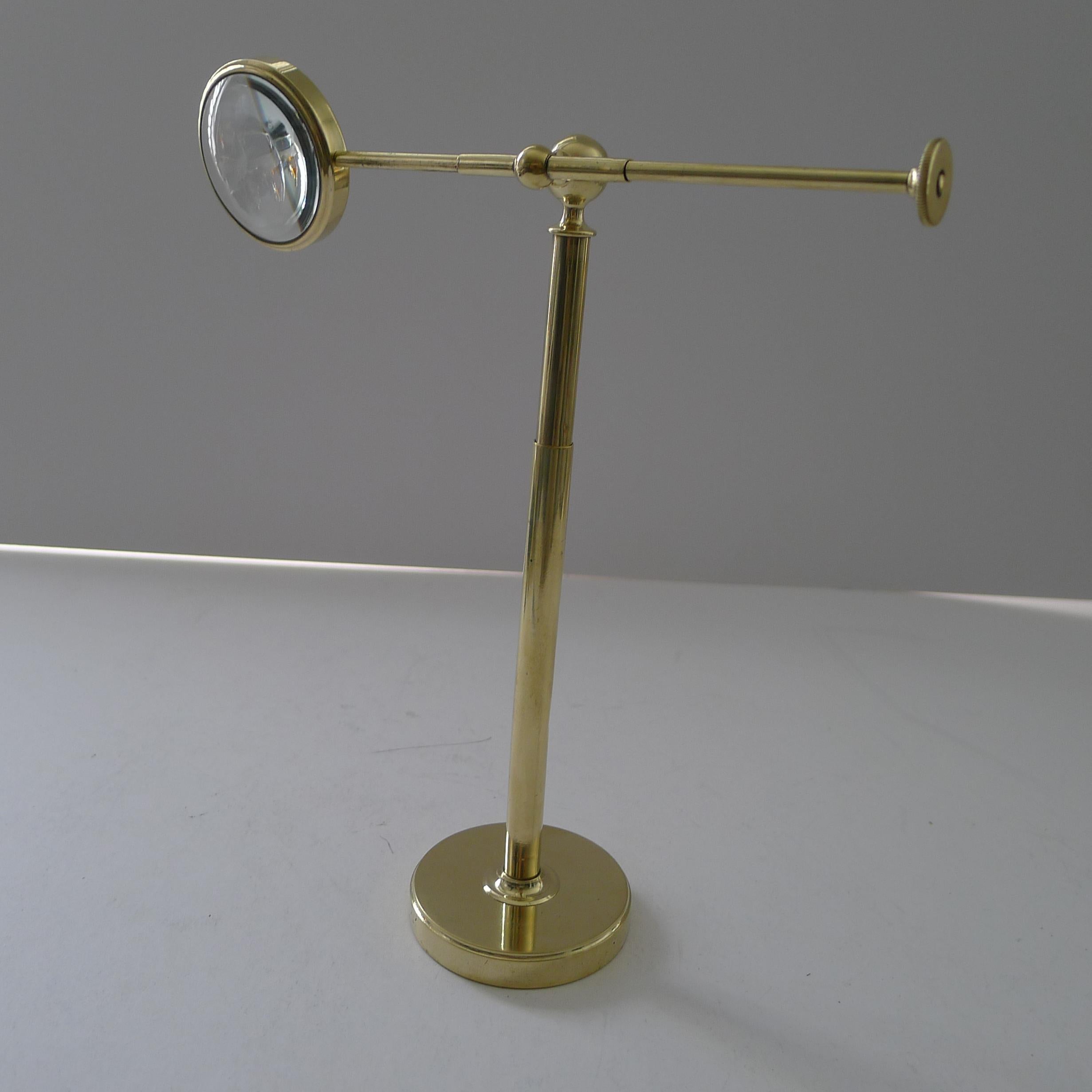 Early 20th Century Brass Pivoting Bullseye Magnifying Glass / Lens on Stand c.1915 For Sale