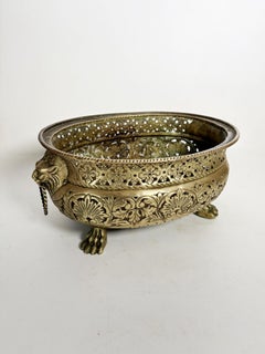 Brass planter decorated with a lion's head and paws, France, 1960