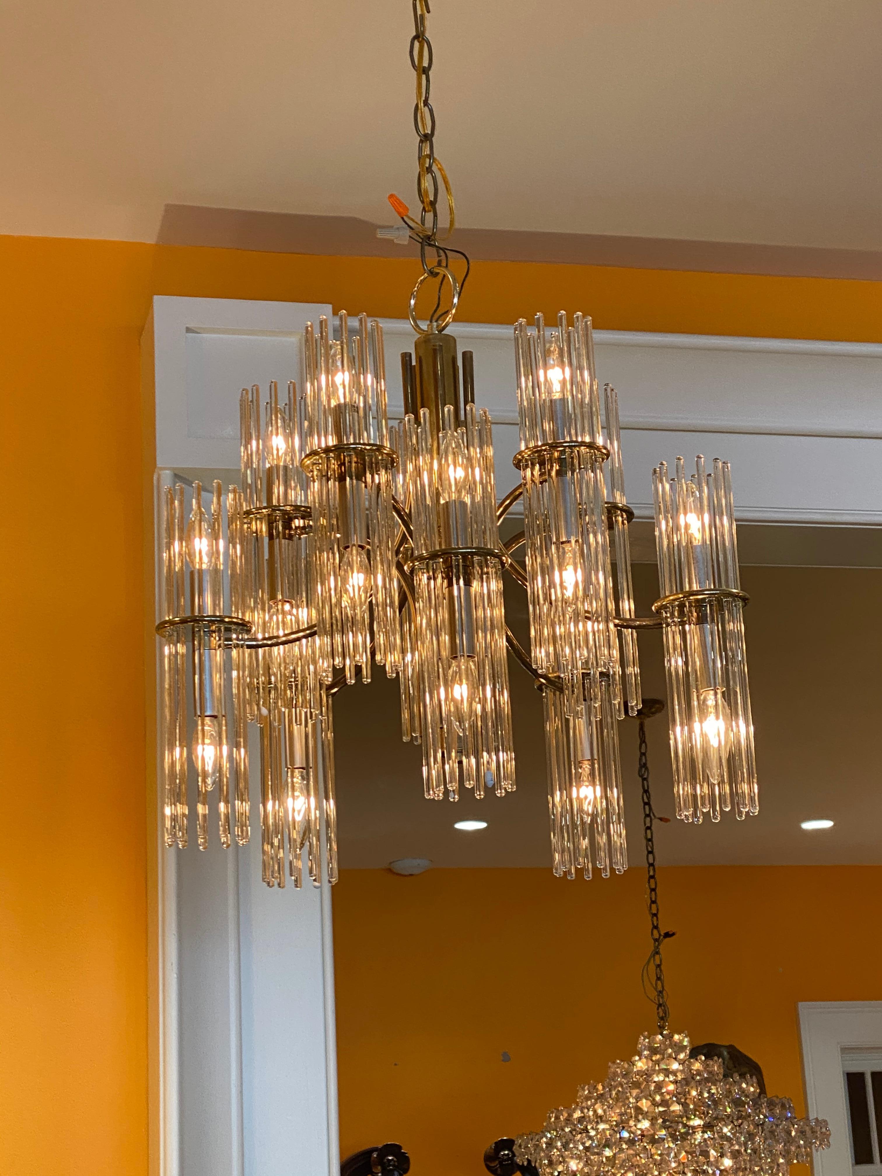 Brass-plated 10 arm midcentury chandelier with glass prisms.