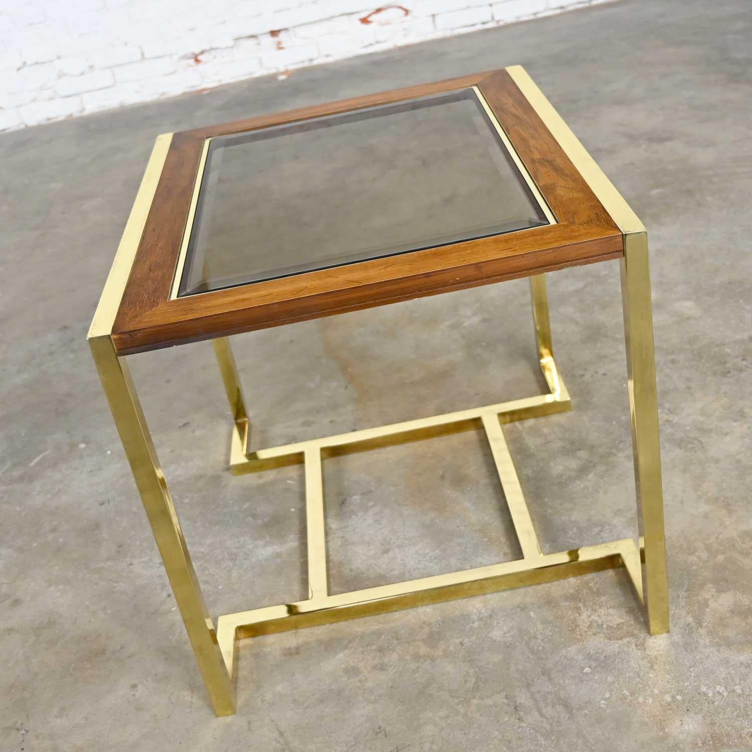 Handsome modern rectangle end table comprised of a polished brass plate frame with a top of dark wood and beveled smoked glass insert, by Thomasville Furniture Ind., in the style of Milo Baughman. Beautiful condition overall. The finish on the wood