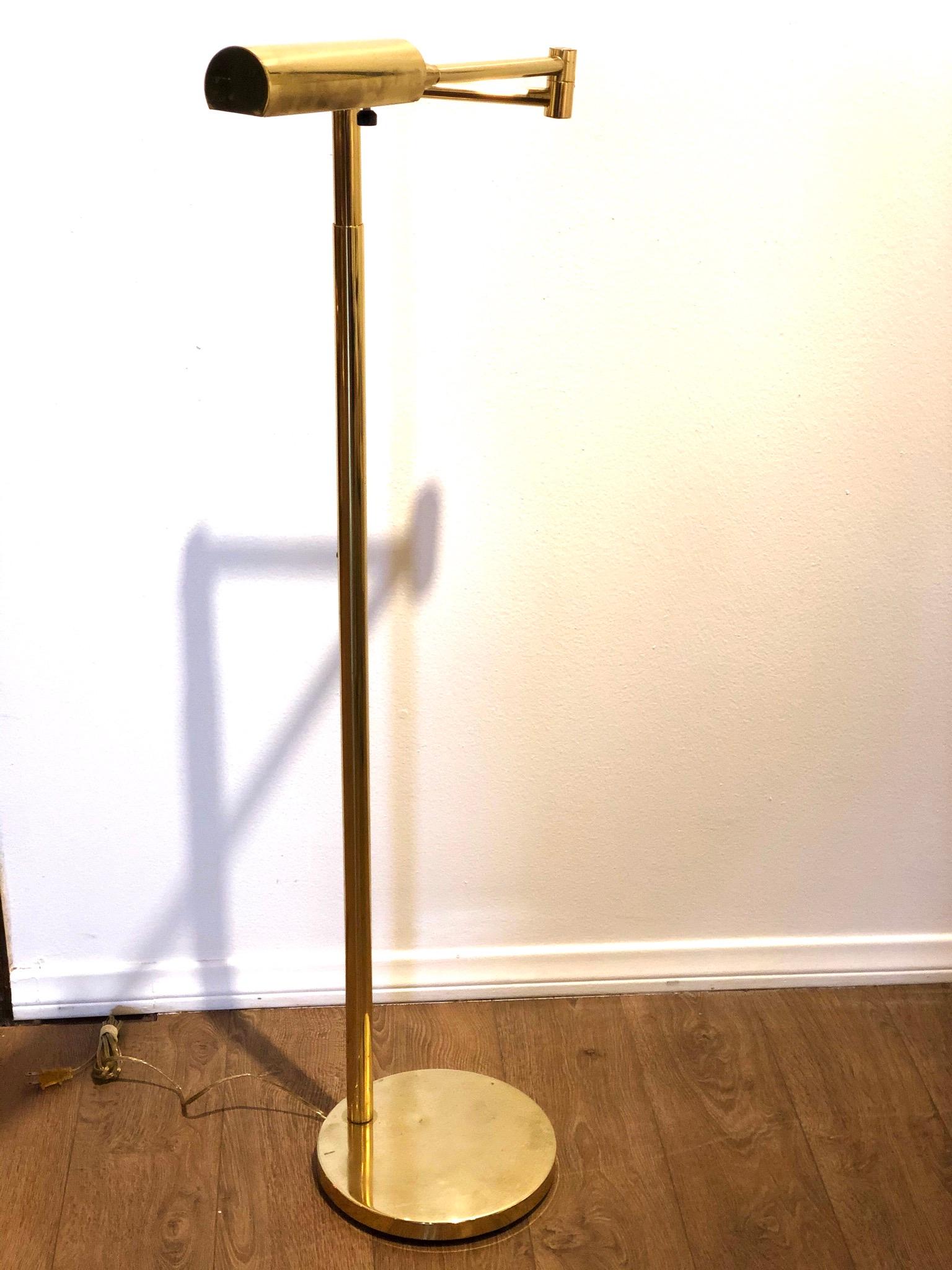 Simple and elegant design on this polished brass floor lamp , with dimmer switch by Koch & Lowy circa 1980s the pole moves up and down, from 41' to 51