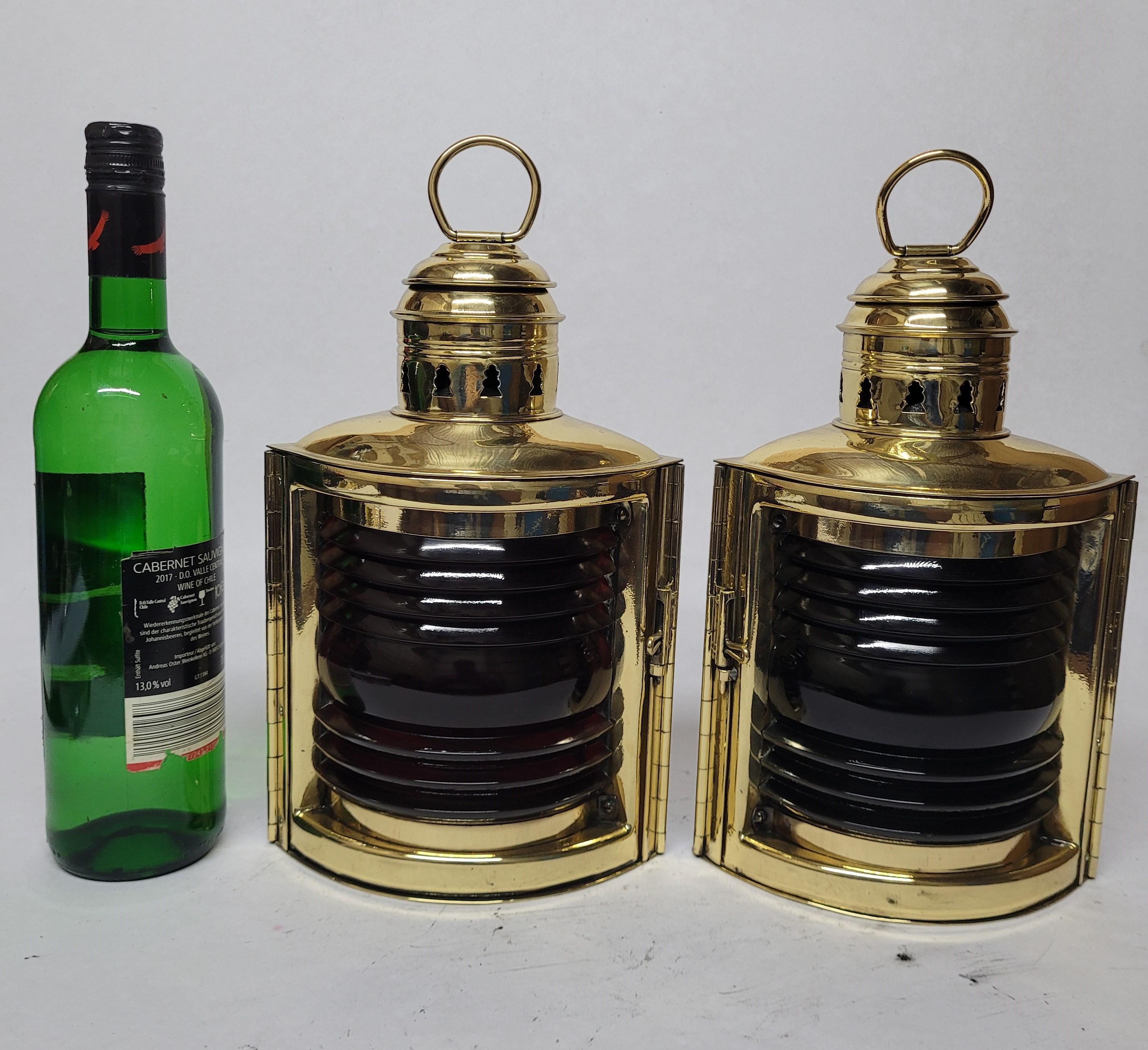 Superb pair of ships port and starboard lanterns. Meticulously polished and lacquered. With makers badges 