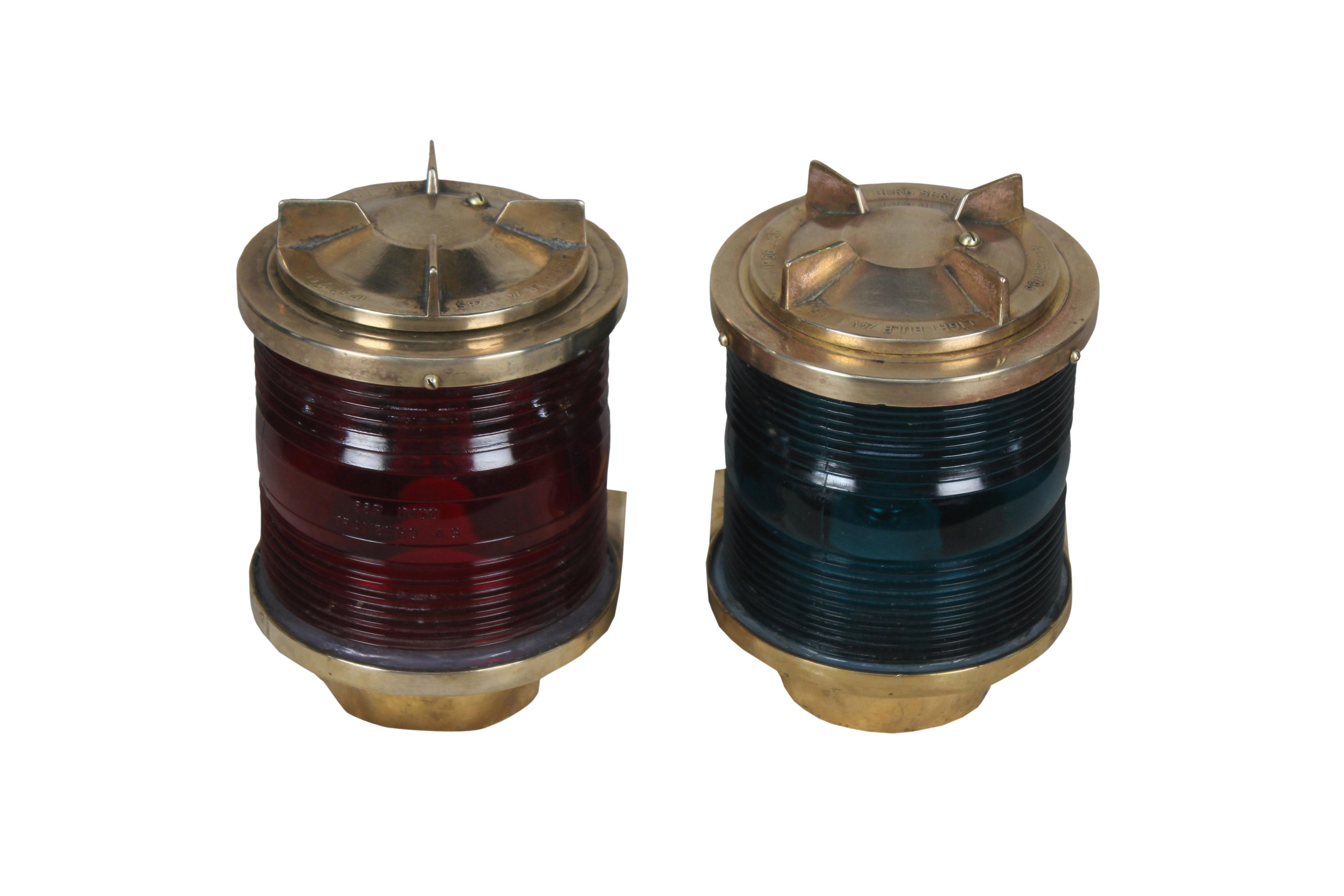 Pair of nautical port and starboard ship's navigational lights in brass with Fresnel lens. Can be wall mounted. Top portion unscrews to gain access to the bulb. It is a closed system so can be used outside. Rewired for American use and takes a