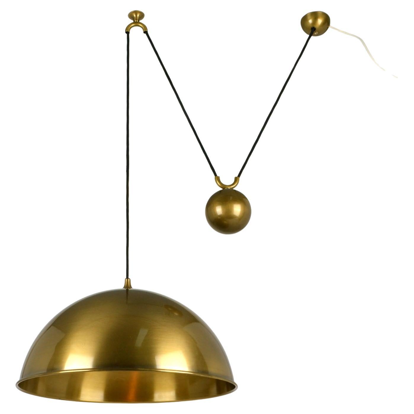 Spun Brass 'Posa' Pendant Side Counter Weight by Florian Schulz For Sale