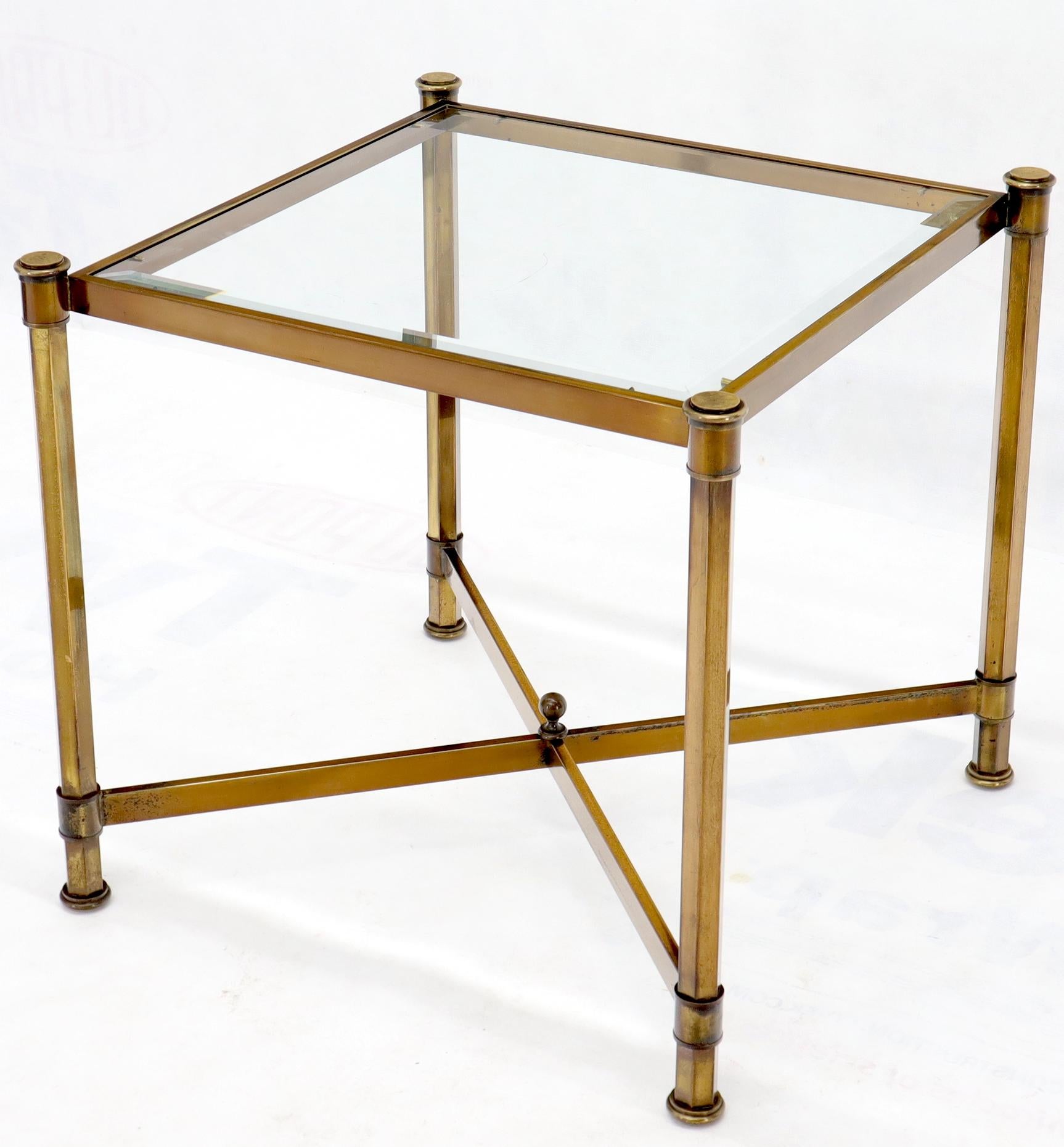 Mid-Century Modern solid brass profile side end table with glass top attributed to Mastercraft.