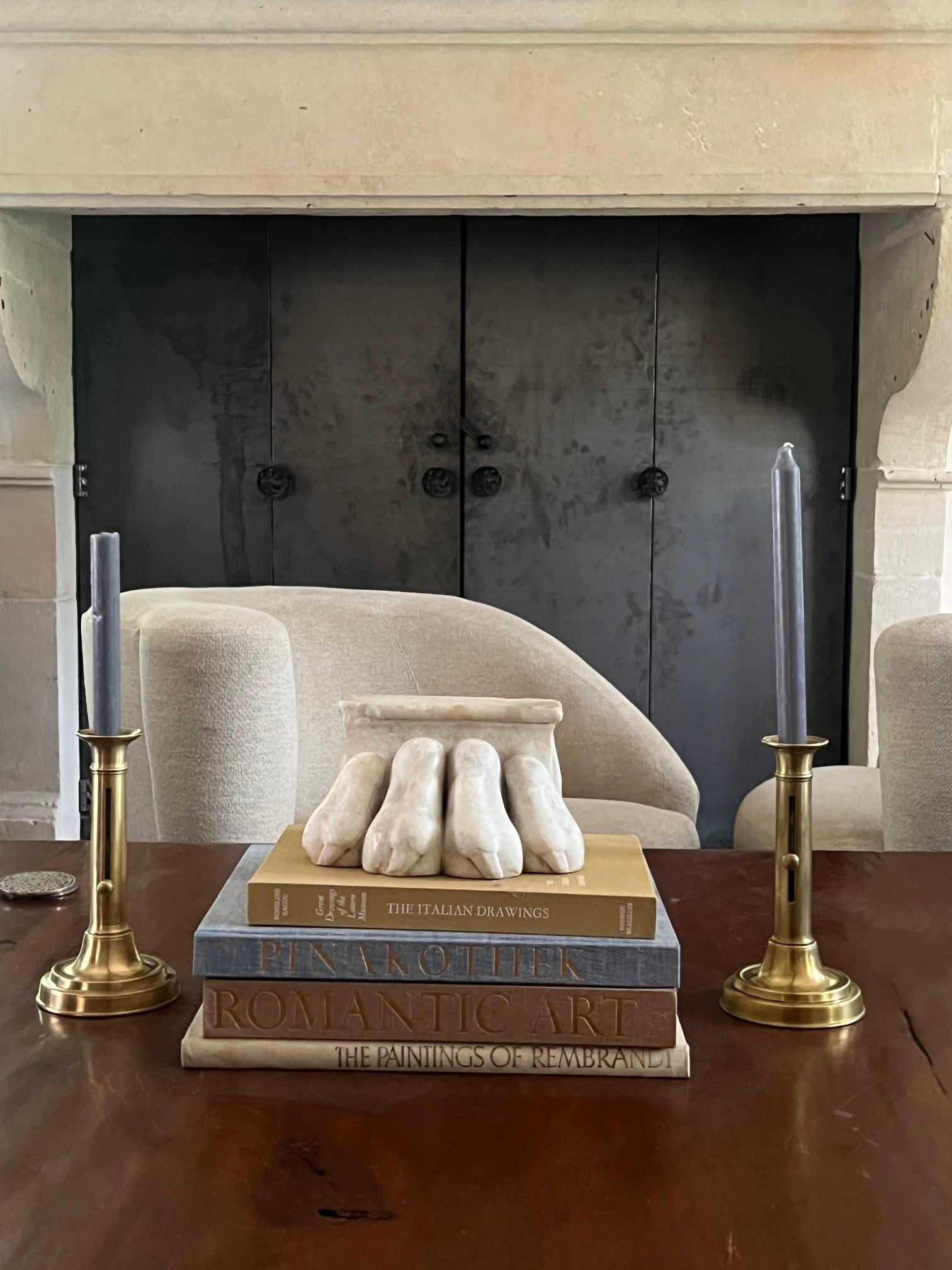 Brass push up candlesticks made in France in the 19th century. The pushup feature is fully functional, the set is matching and well rounded at the base with no dents.