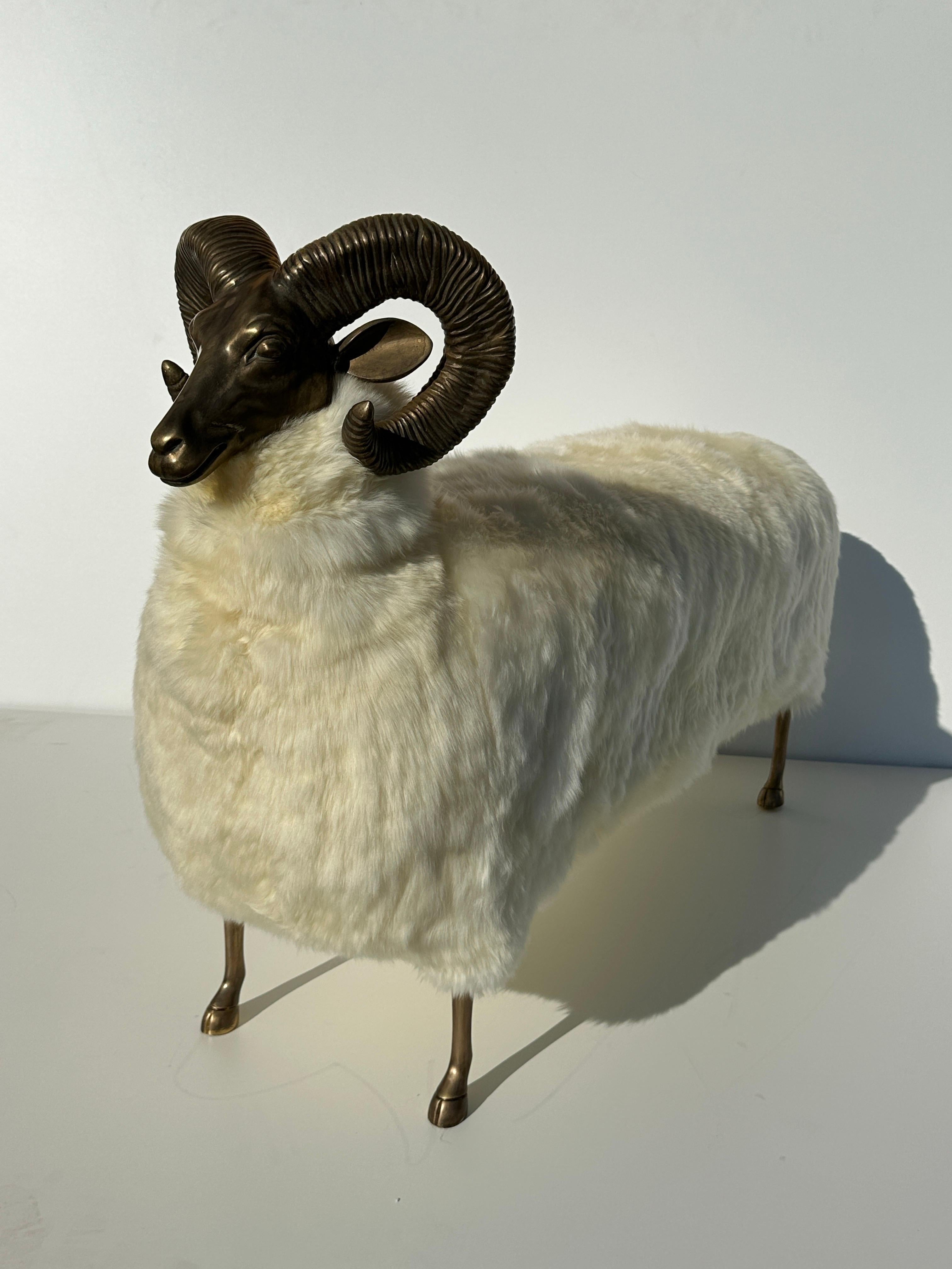 Brass and sheepskin ram sculpture bench. Perfect companion for entryways or in front of a bed .