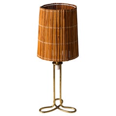 Tischlampe aus Messing und Rattan Model No. 61052 von Mauri Almari für Idman, Finnland, 1950er Jahre