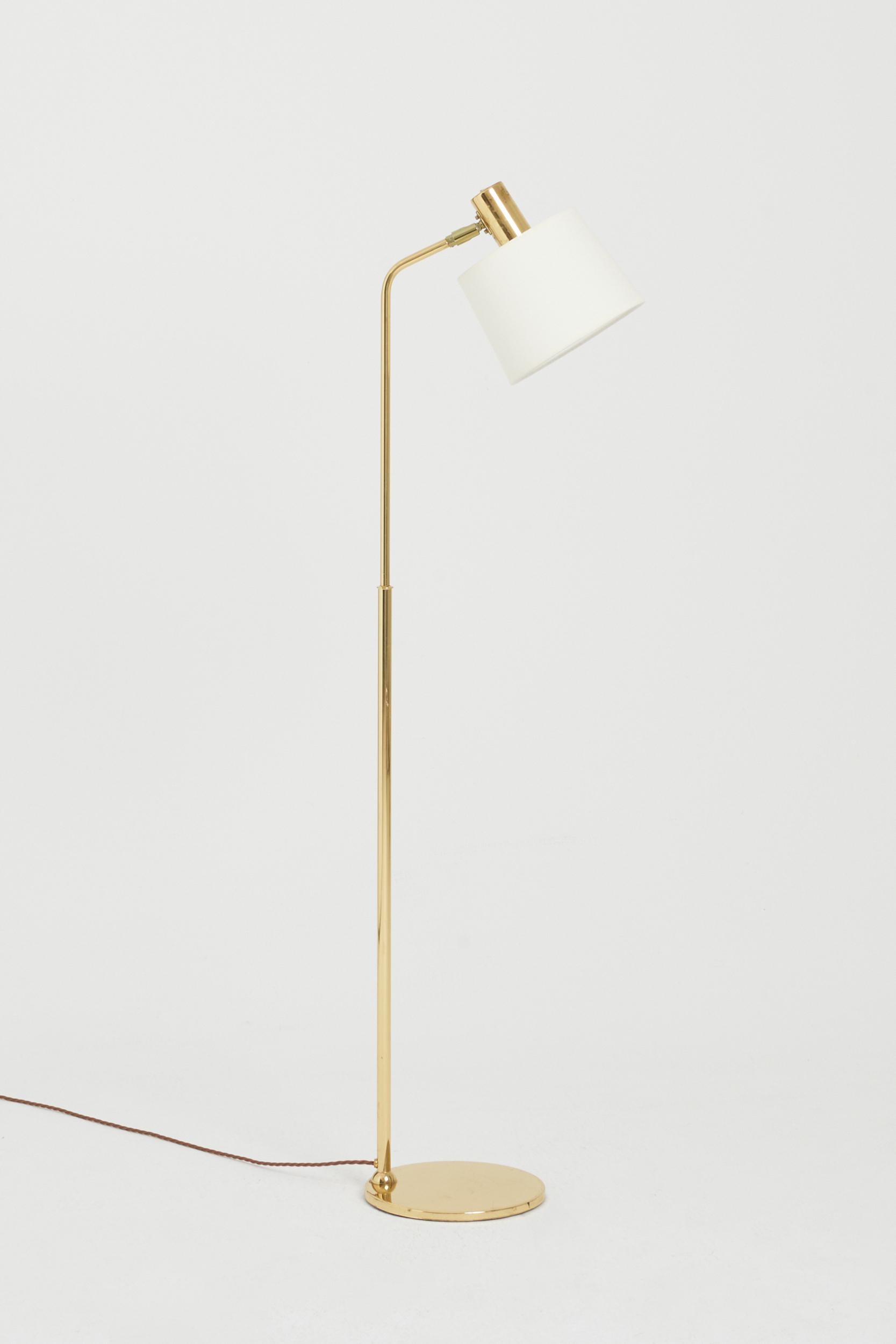 A brass reading floor lamp 
Sweden, 1970s
137 cm high by 25 cm wide by 40 cm depth