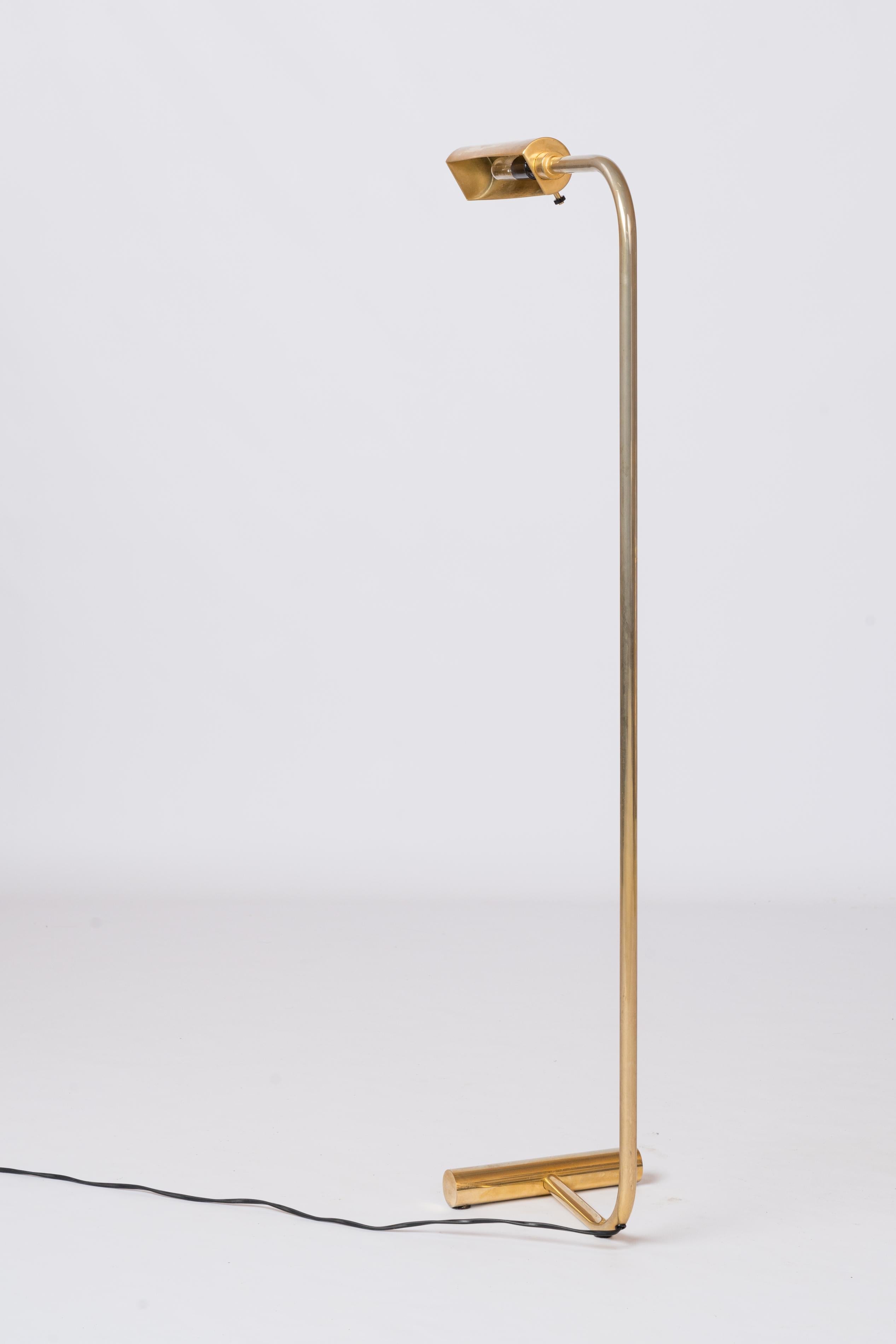 Iconic reading lamp by Christian Liaigre in classy brass finish. Shades rotates 360°. Original 