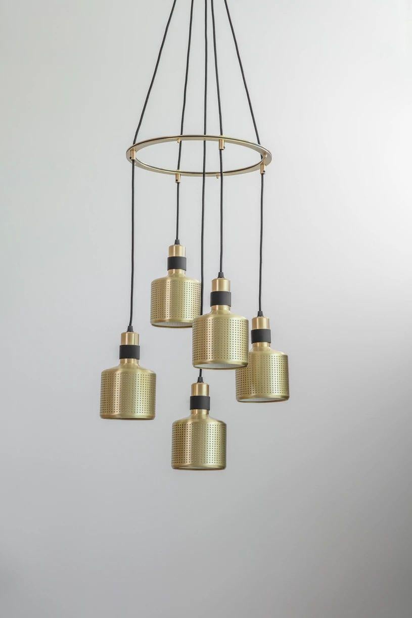 Brass riddle cluster light 5 by Bert Frank
Dimensions: H 20 x W 12 x D 12 cm each lamp
Materials: brass and steel

Available finishes: brass and black
All our lamps can be wired according to each country. If sold to the USA it will be wired for