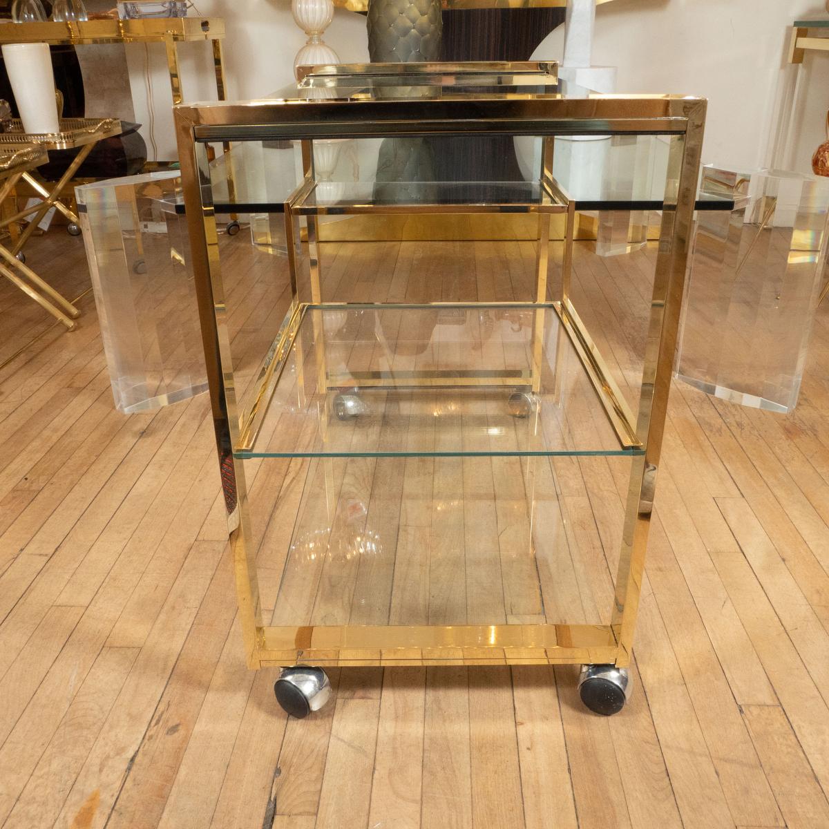 Brass rolling bar cart with glass shelves In Good Condition For Sale In New York, NY