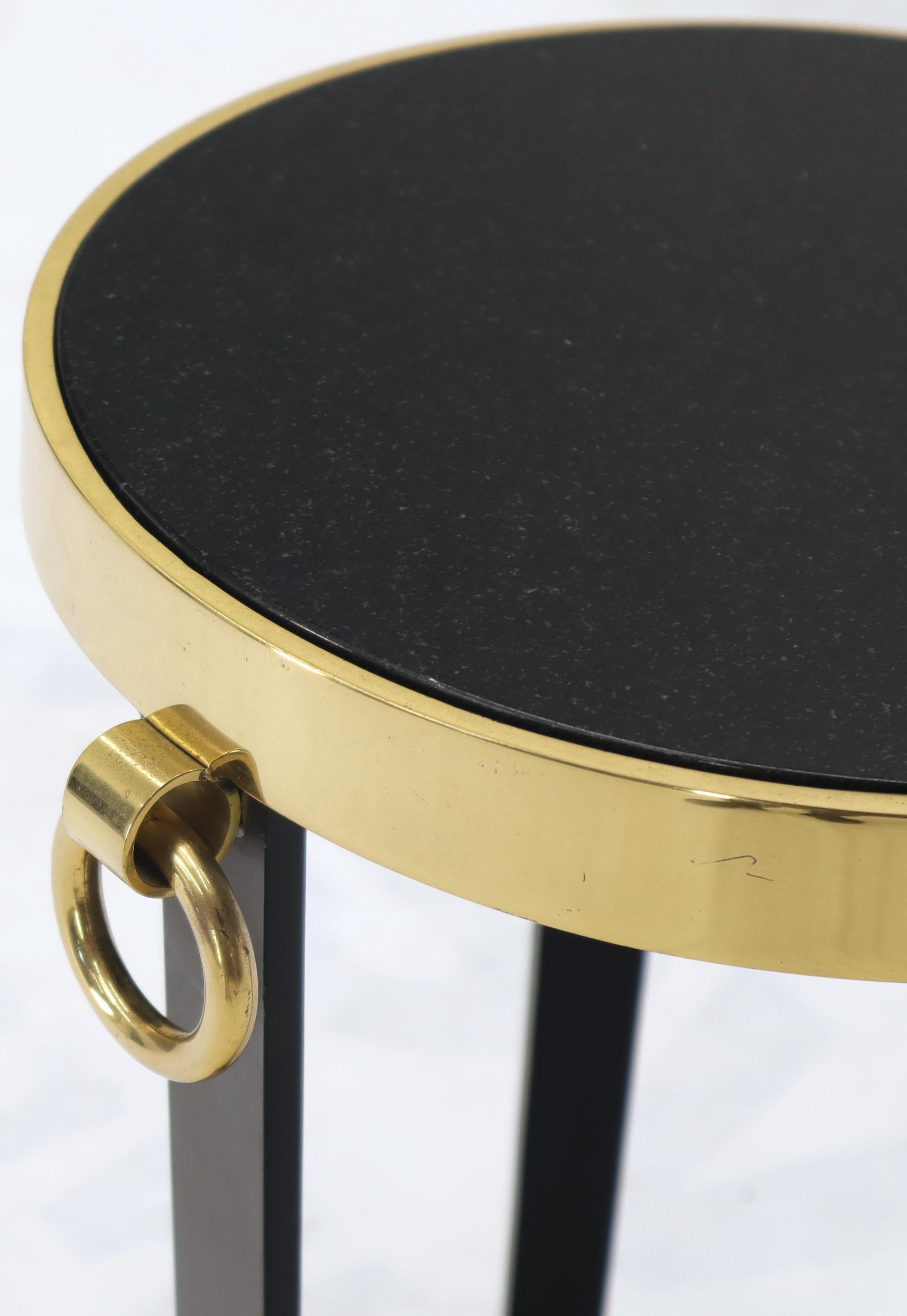 Hollywood Regency Brass and Round Black Granite Top Tri Legged Pedestal End Side Table For Sale