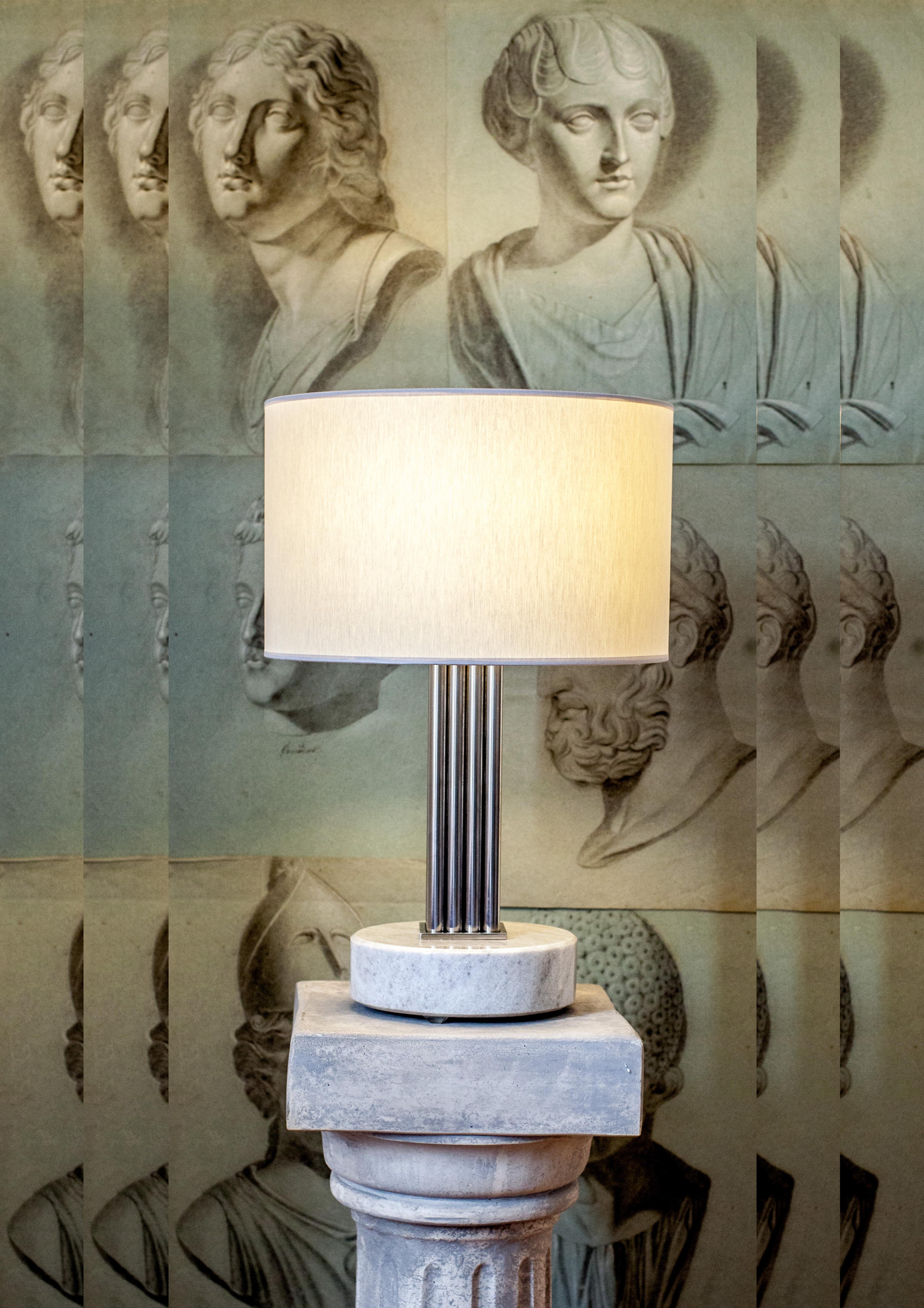 Brass sculpted table lamp by Bijelic and Brajak
Athens 1.4
Mura marble (also available with Carrara marble)
Polished brass
Dimensions: 53 x 35 x 35 cm
white or black cotton lampshade, cotton wiring


Bijelic and Brajak are two architects from