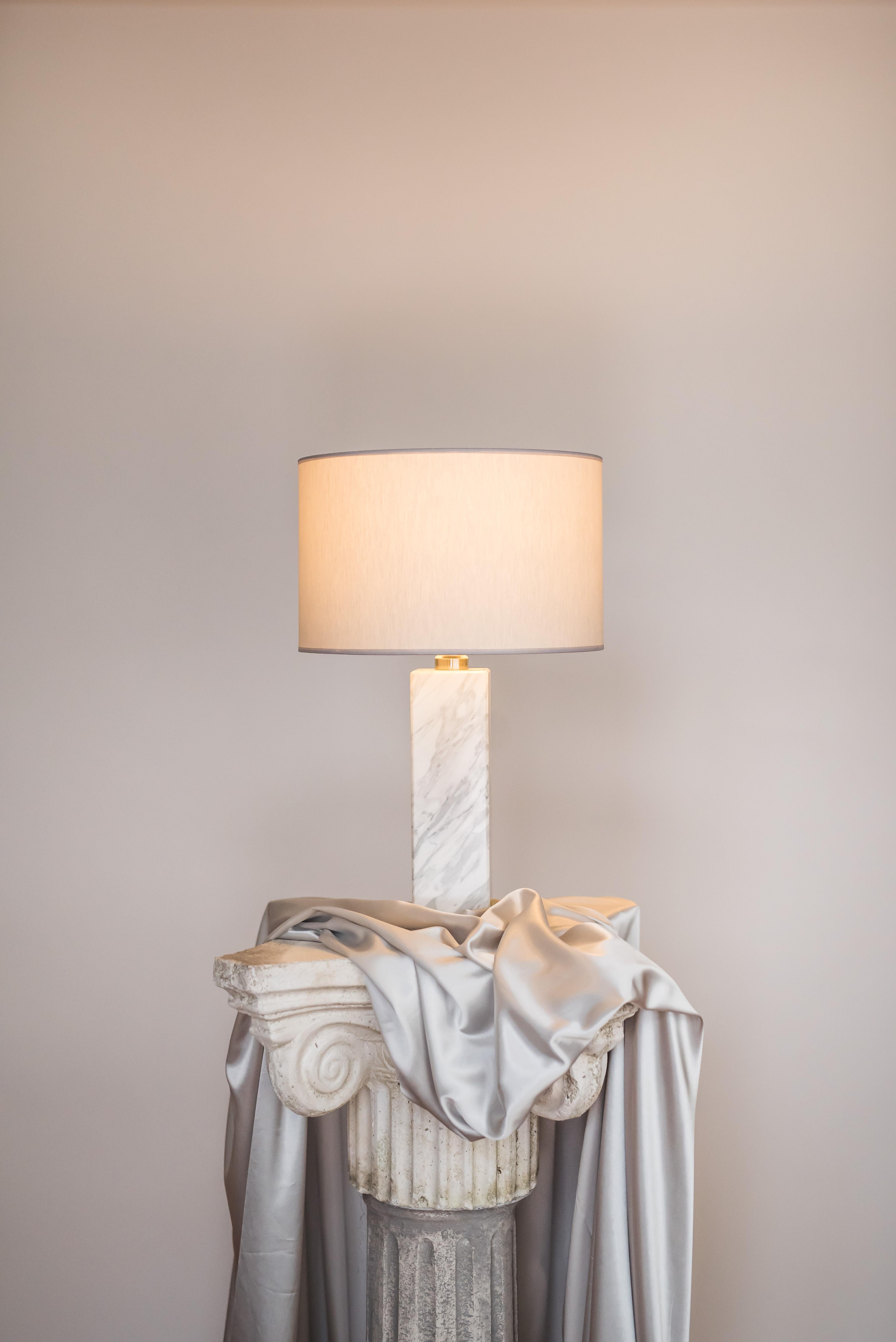Brass sculpted table lamp by Brajak Vitberg
ATHENS 1.2
Mura marble (also available with Carrara marble)
Polished brass
Dimensions: 52 x 35 x 35 cm
white or black cotton lampshade, cotton wiring


Bijelic and Brajak are two architects from Ljubljana,