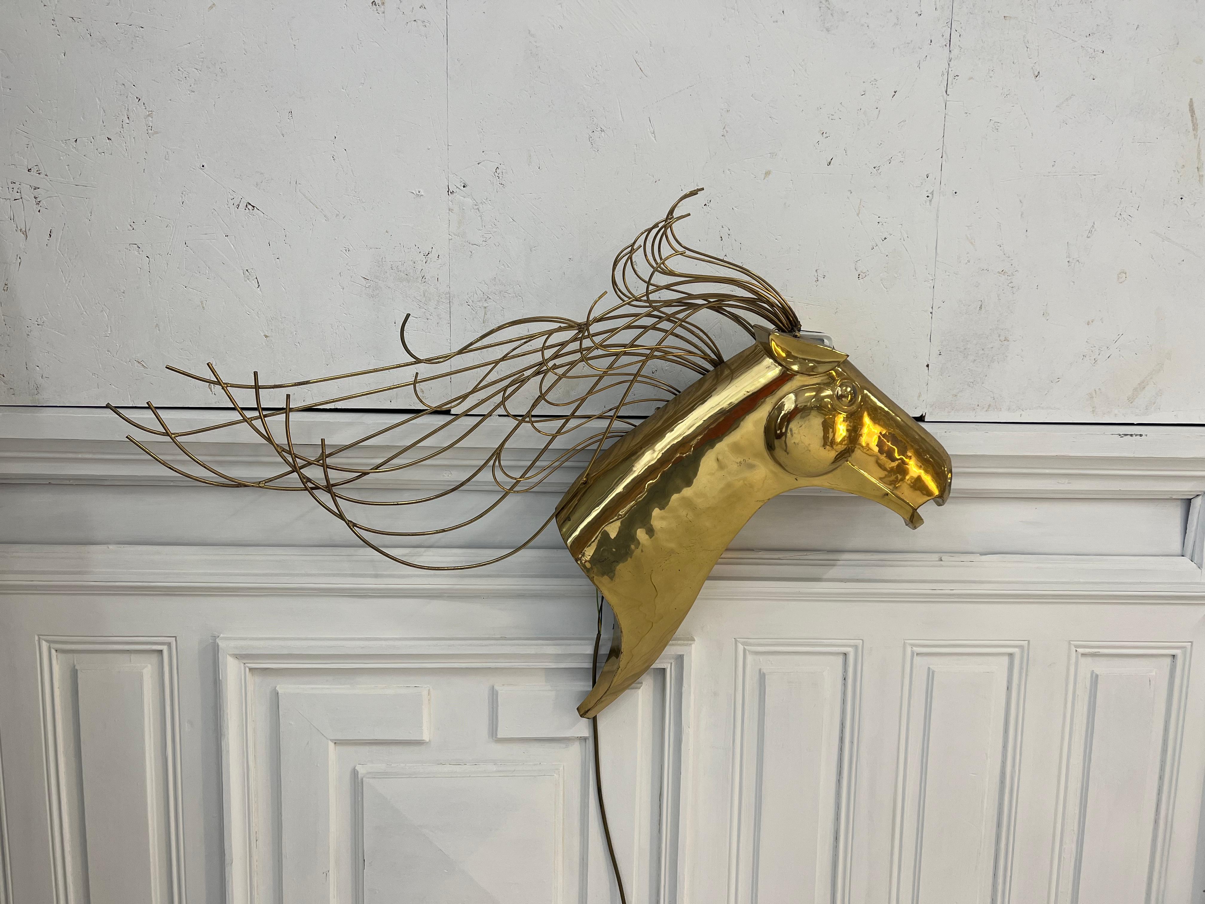 splendid brass sculpture by Curtis Jeré, signed and dated 1984
the mane is finely worked with brass wire
it will be a magnificent element of decoration, which will light up to give it a shine

Although the name Curtis Jeré is familiar to many as