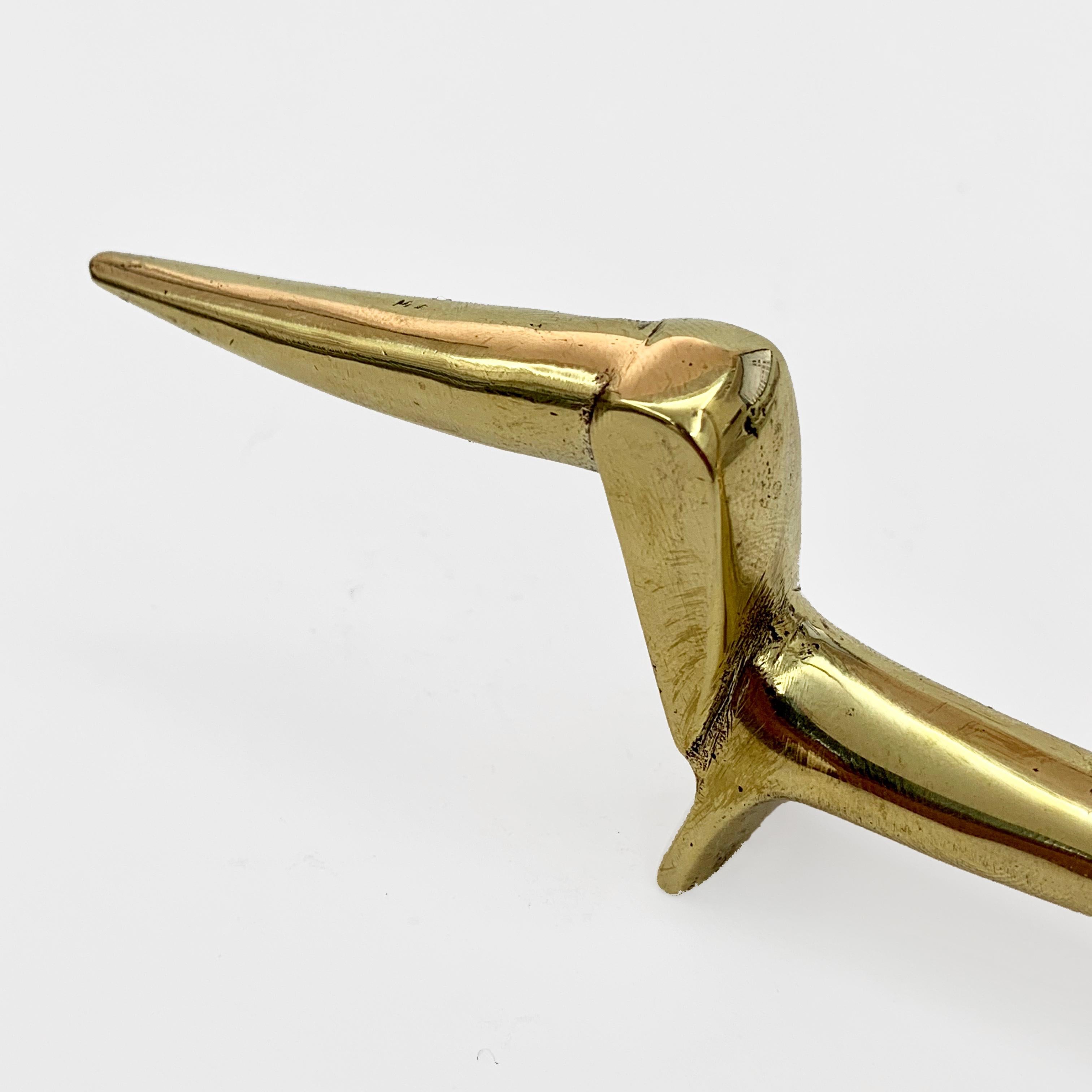 Dog Dachshund in brass, ring holder, Austria, 1960s
Attributable to Walter Bosse.