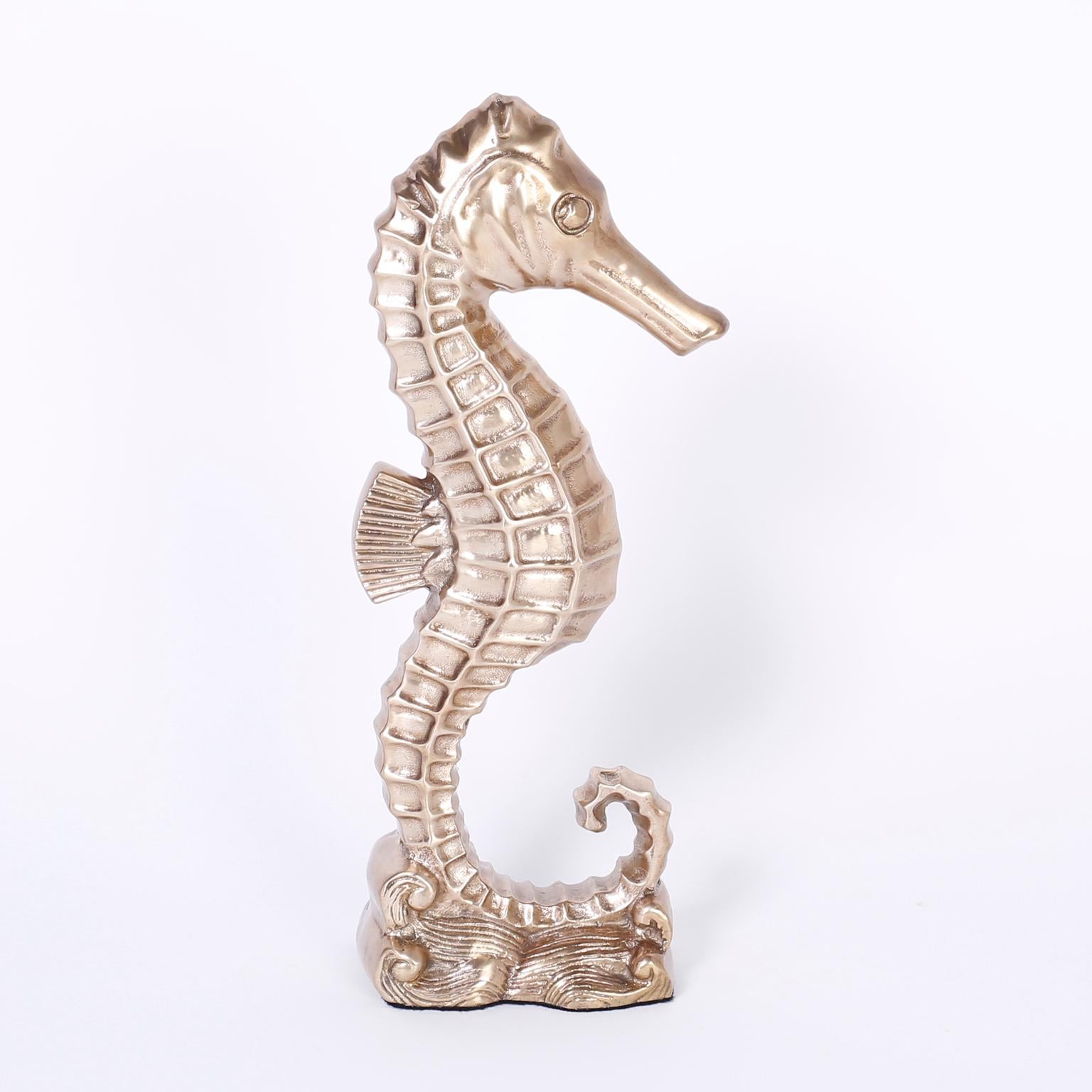 Whimsical cast brass sea horse with attitude, hand polished and lacquered for easy care.