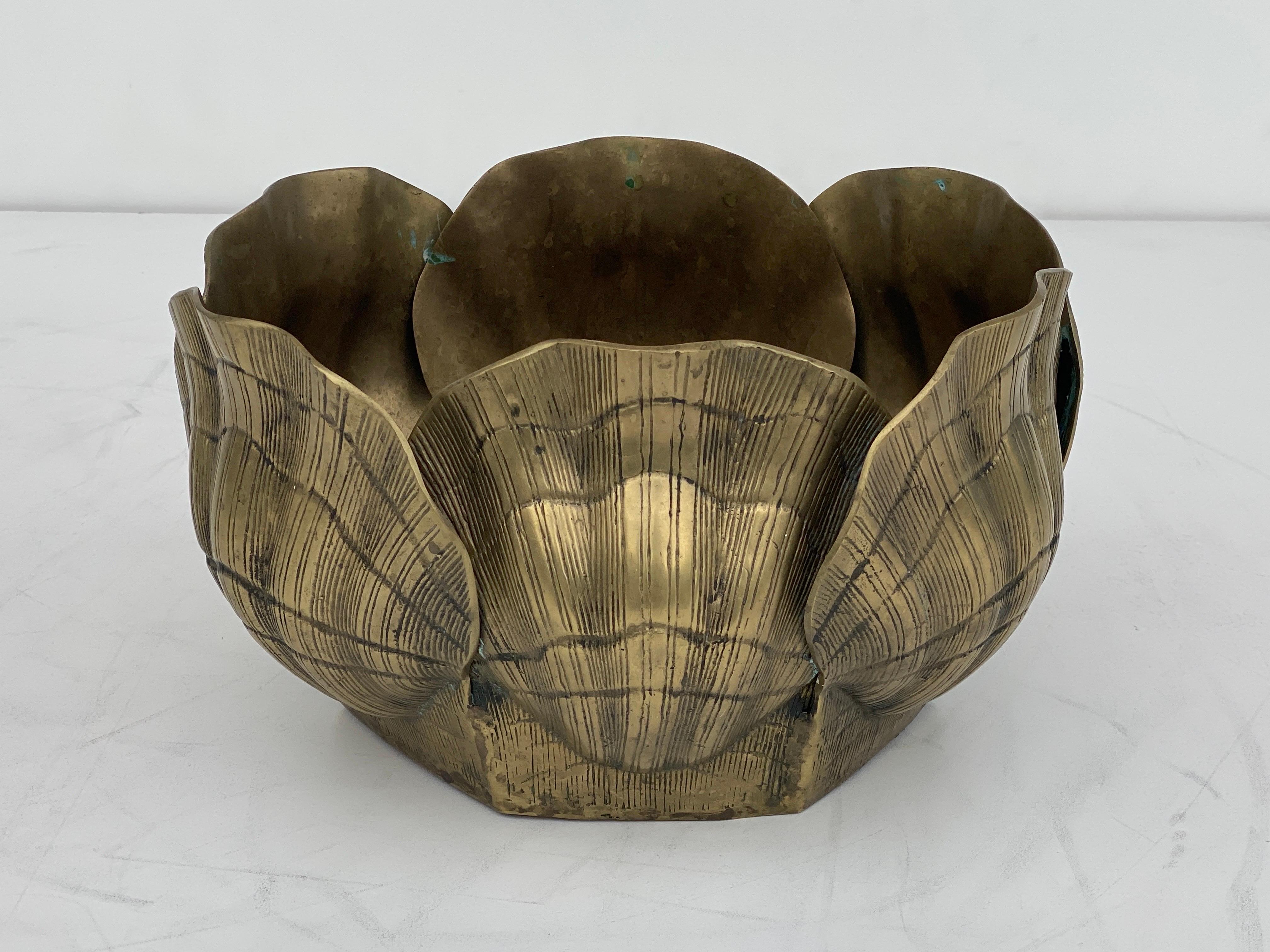 Large patinated brass sea shell planter. Some tarnishing and age spots characteristic to brass.