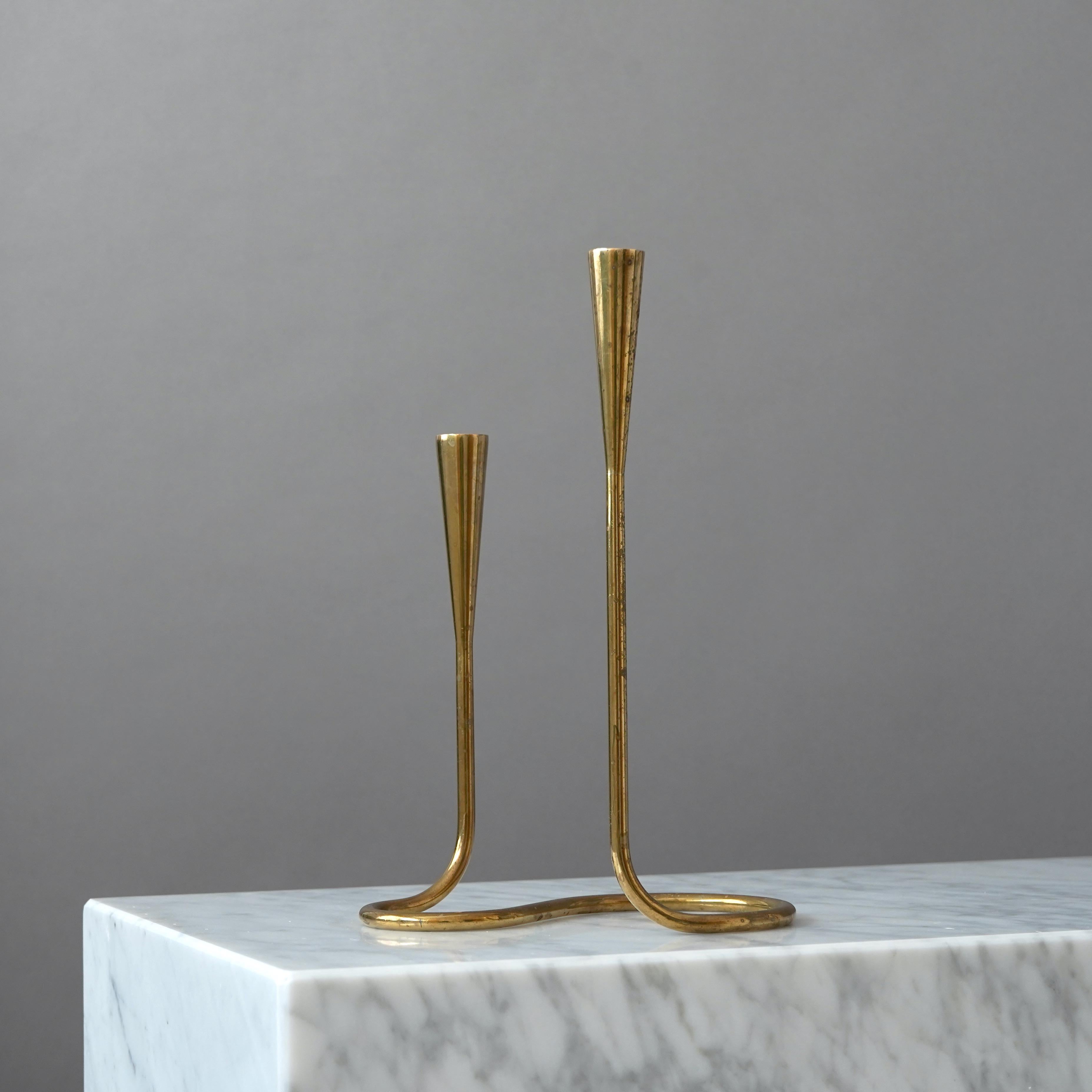 Scandinavian Modern Brass Serpentine Candlestick by Illums Bolighus. Denmark, 1950s For Sale