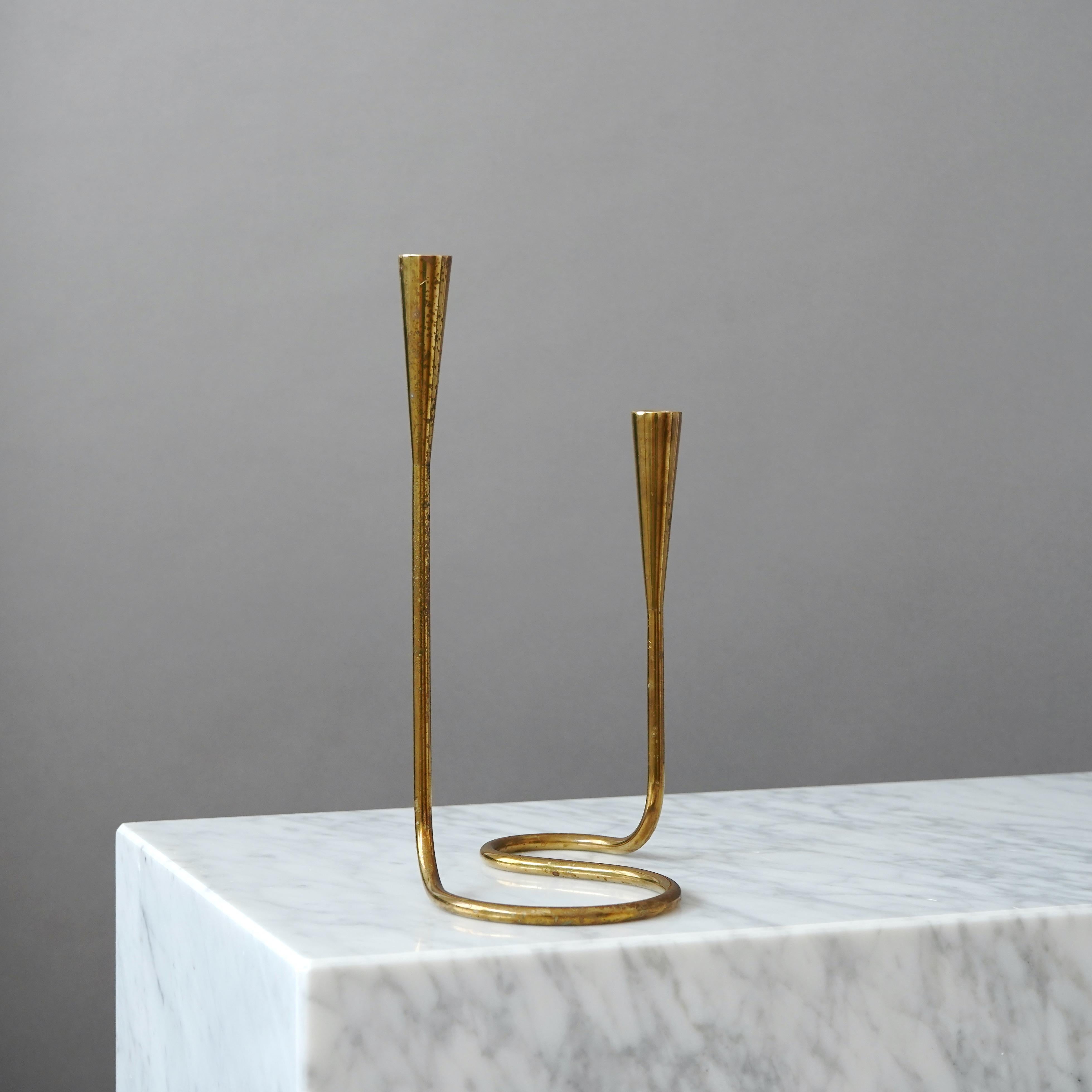 Danish Brass Serpentine Candlestick by Illums Bolighus. Denmark, 1950s For Sale